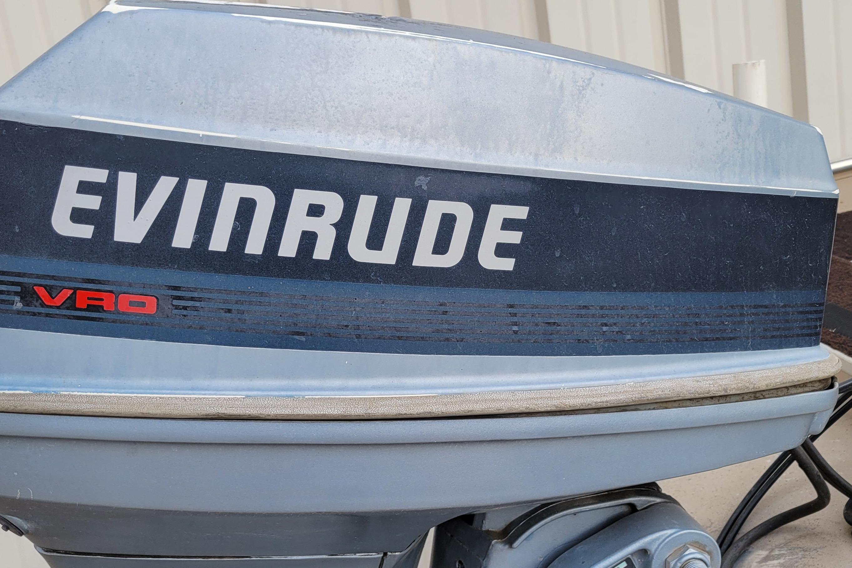 Evinrude VRO outboard motor on 1987 Alumacraft Classic 165 CS boat.