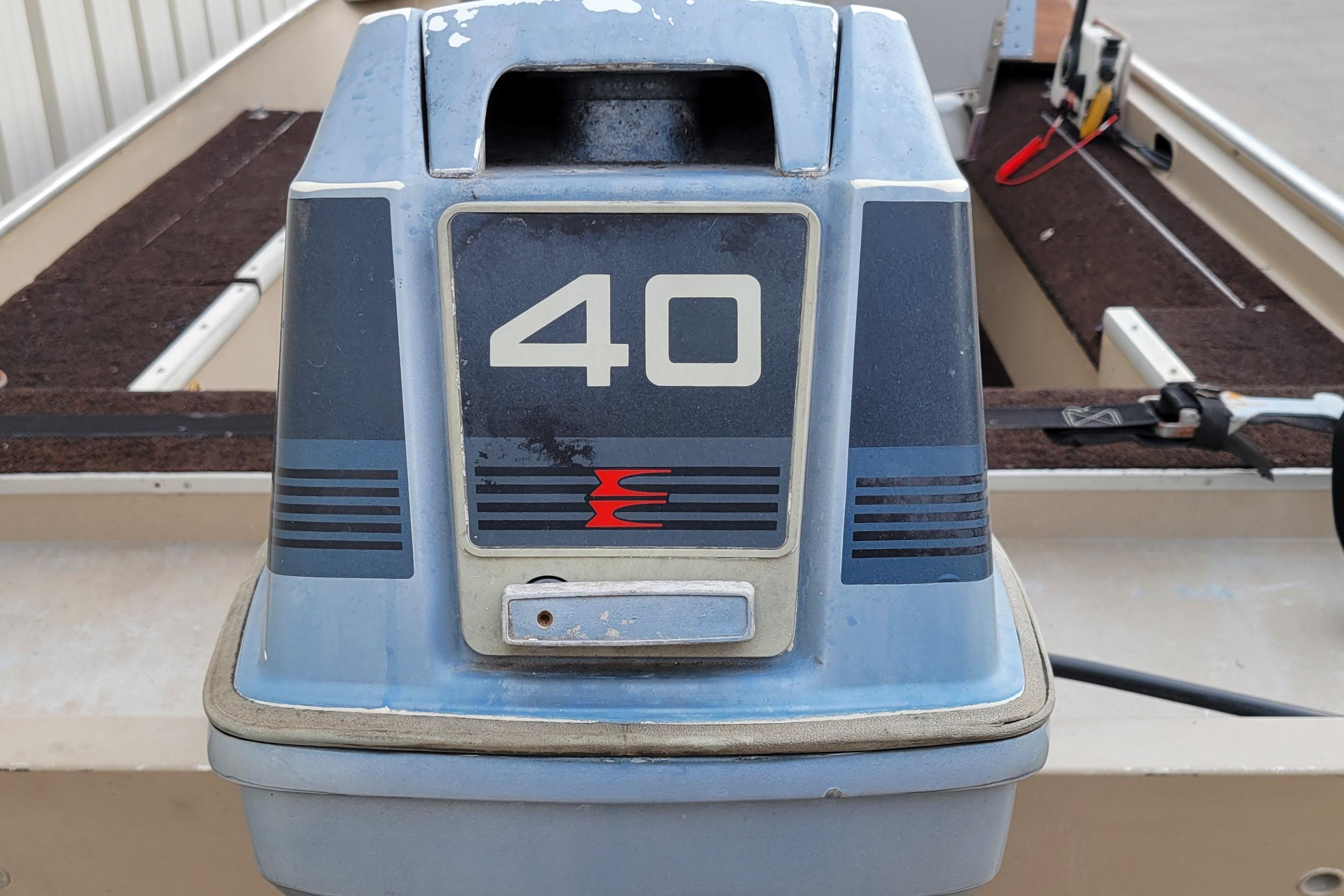 1987 Alumacraft Classic 165 CS boat with a 40 HP outboard motor.