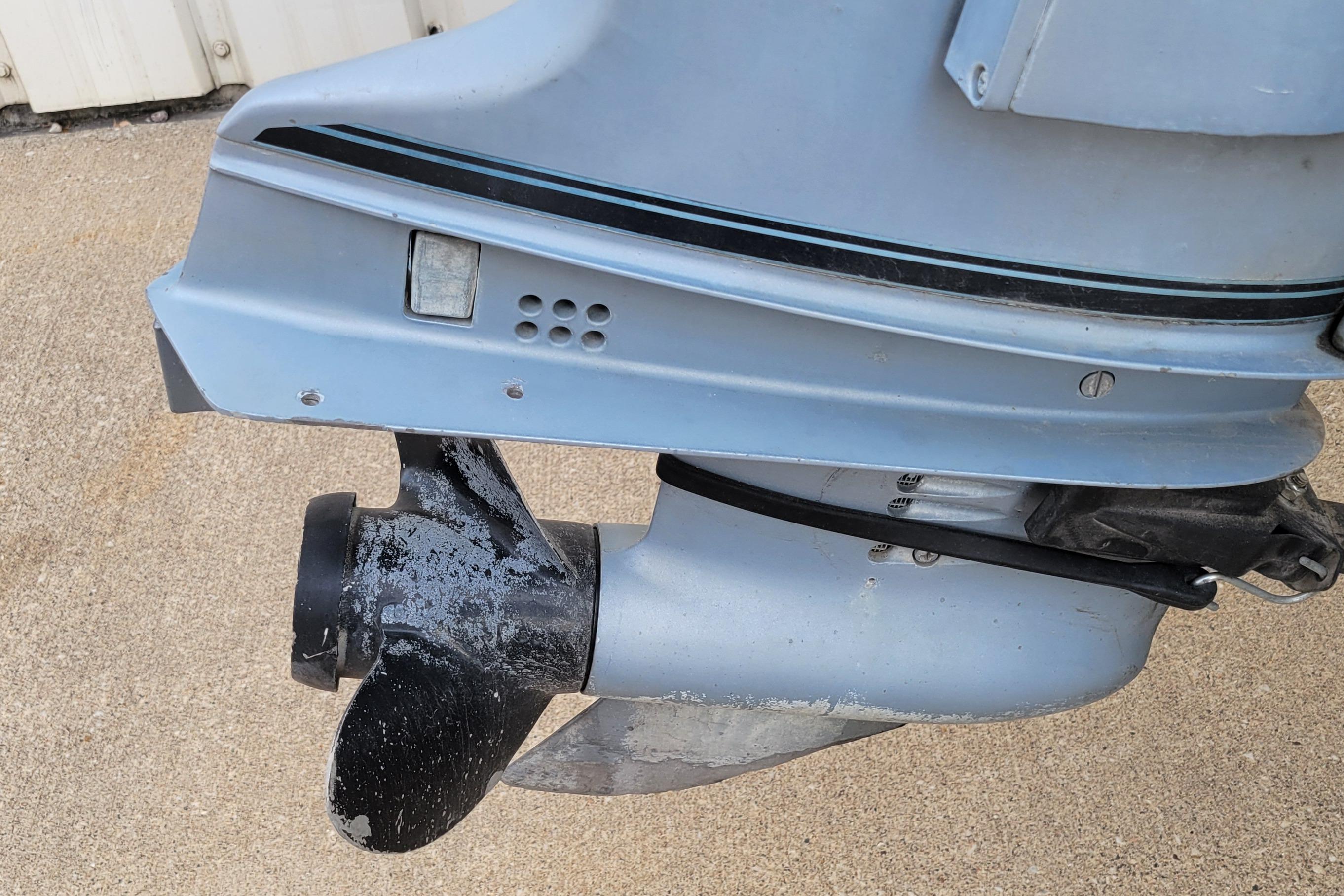 Close-up of a 1987 Alumacraft Classic 165 CS boat motor propeller.