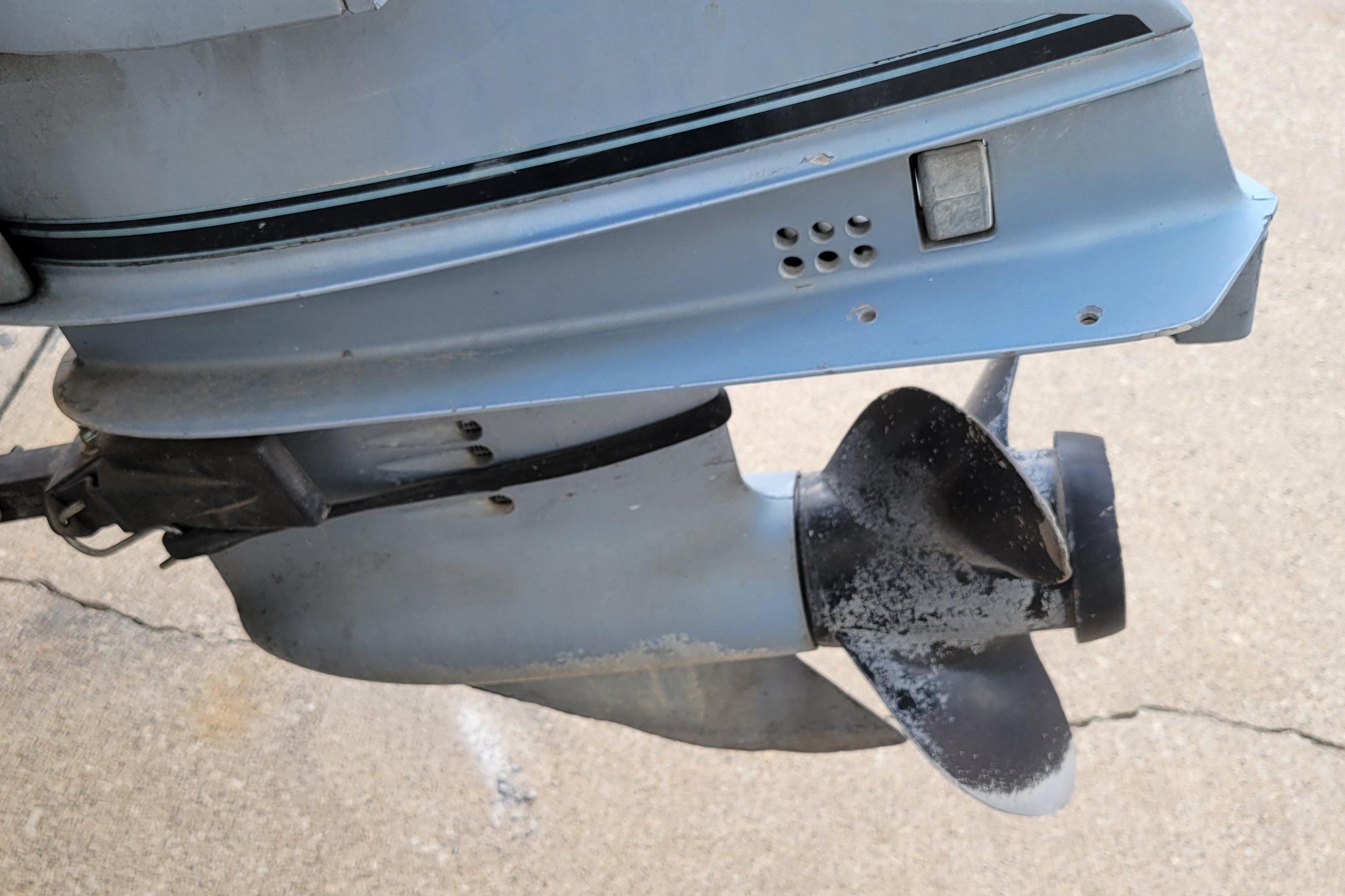 Close-up of a 1987 Alumacraft Classic 165 CS boat motor propeller.