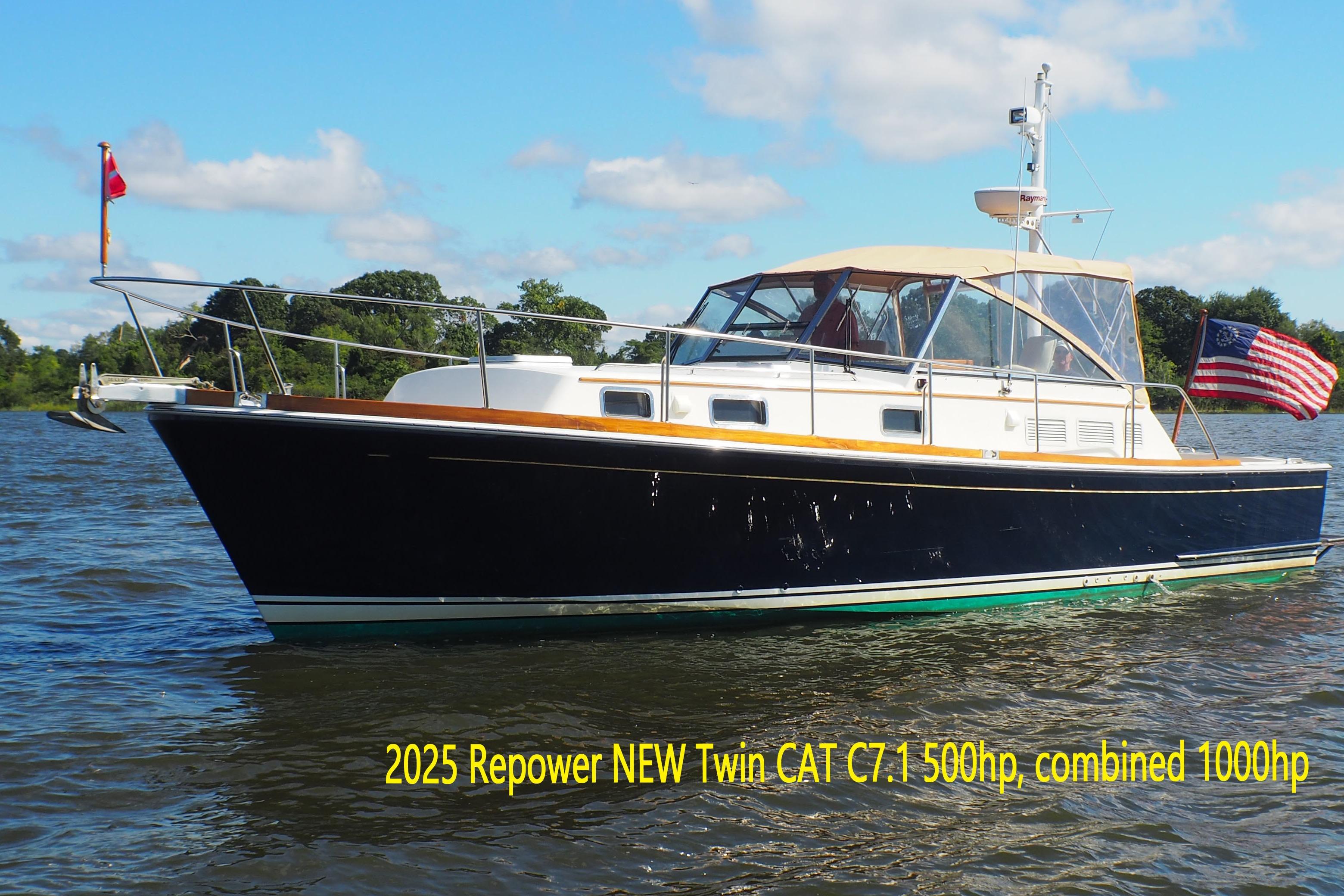 1995 Grand Banks 38 Eastbay EX yacht on water, repowered with twin CAT engines.