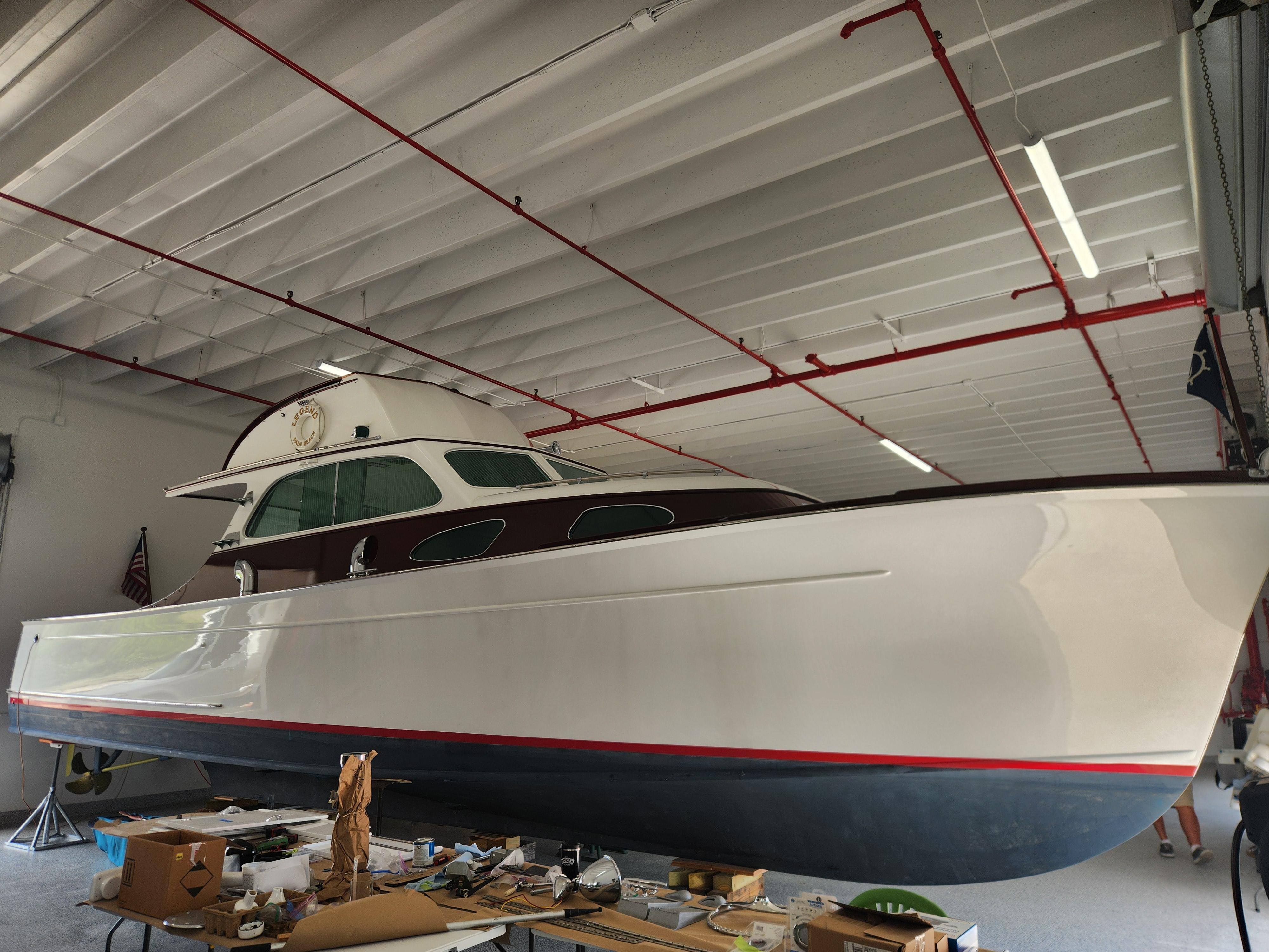 Rybovich-Sport Fish 1949-Legend FL-US-1949 Rybovich Sport Fish boat in a garage, showcasing classic design and craftsmanship.-9527028 | Thumbnail