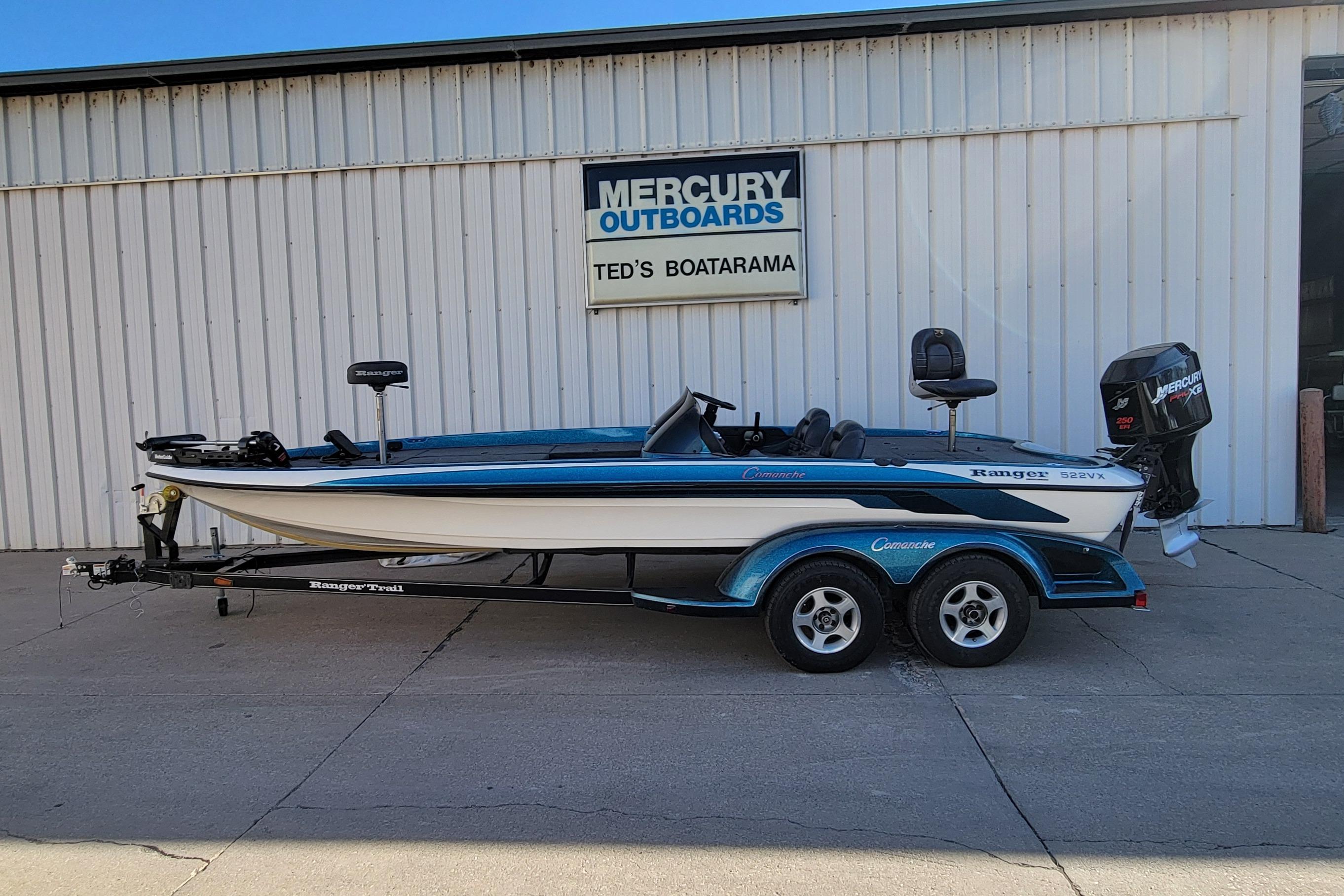 2000 Ranger 522DVX Comanche boat on trailer at Ted's Boatarama, Mercury outboard.