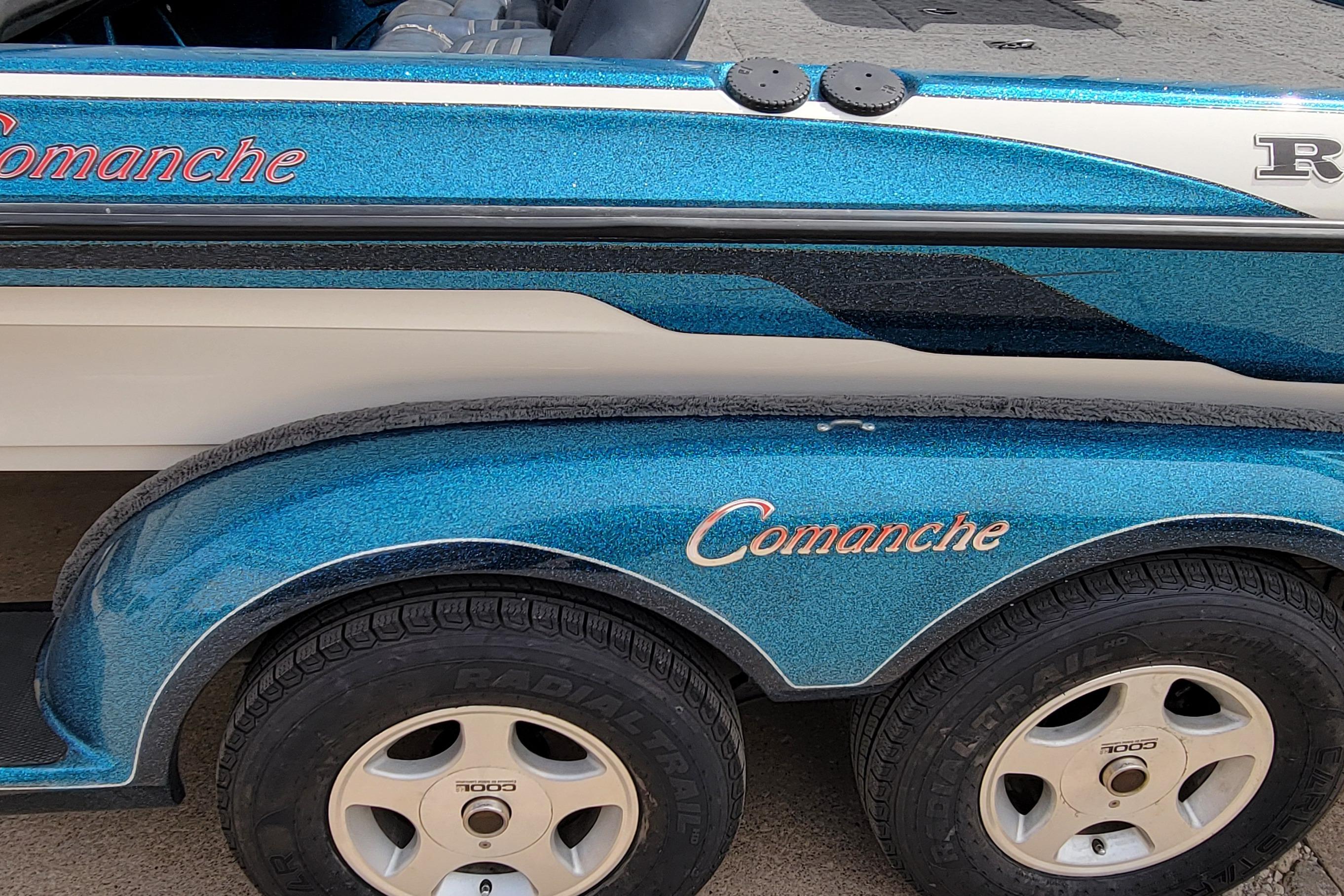 2000 Ranger 522DVX Comanche boat trailer with blue metallic finish and branded lettering.