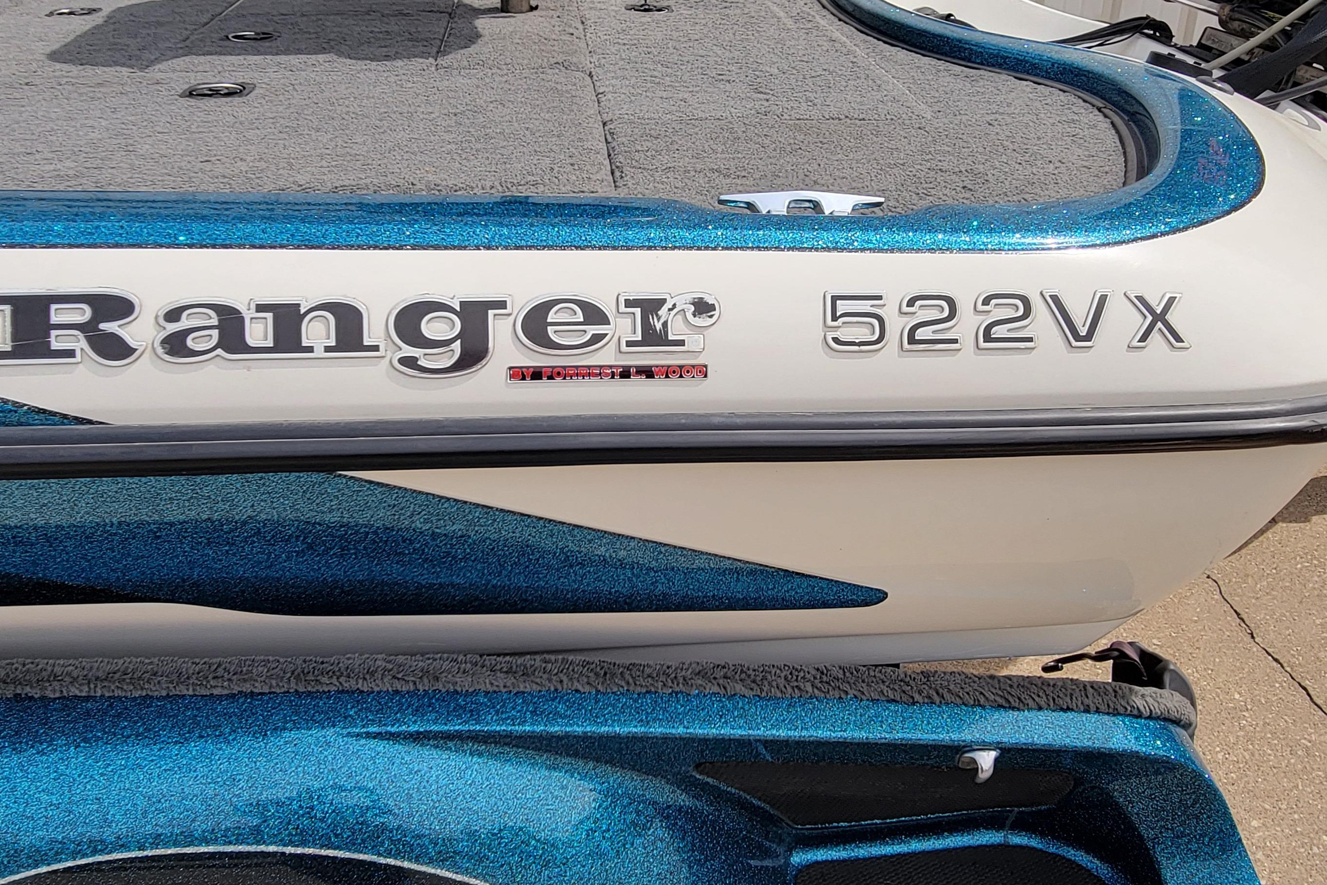 2000 Ranger 522DVX Comanche boat with blue and white detailing.