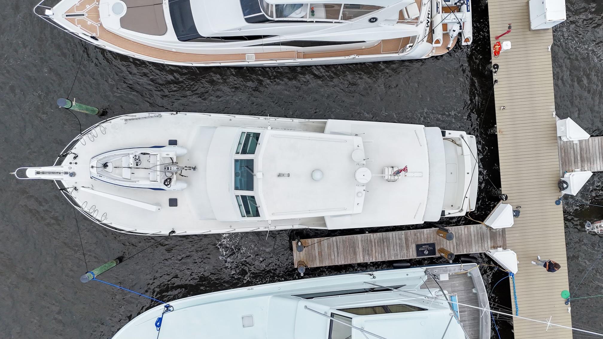 Viking-60 Cockpit Sport Yacht 1996-Sea Tiger FL-US-Overhead view of a 1996 Viking 60 Cockpit Sport Yacht docked at a marina.-9787053 | Thumbnail