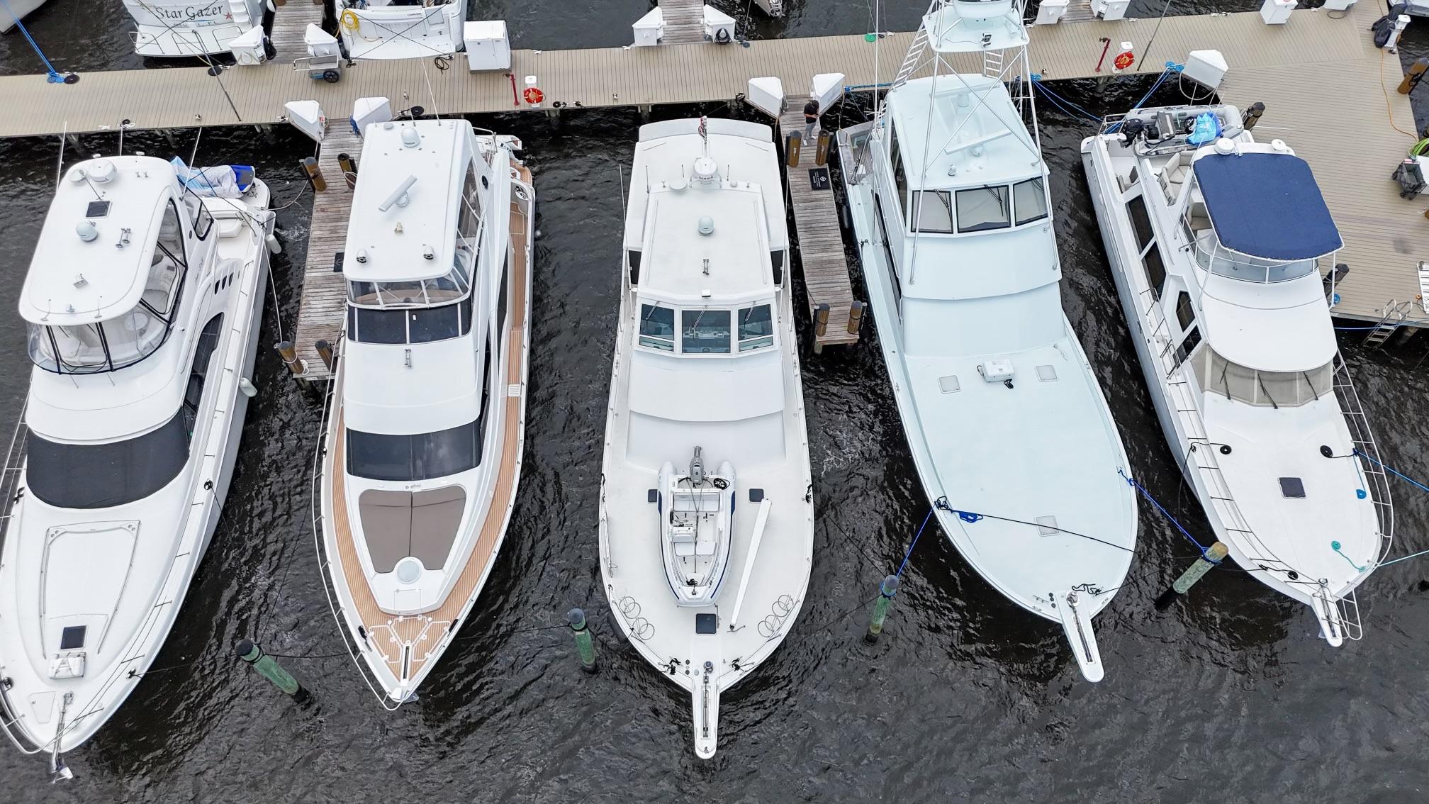 Viking-60 Cockpit Sport Yacht 1996-Sea Tiger FL-US-Five yachts docked at a marina, including a 1996 Viking 60 Cockpit Sport Yacht.-9787053 | Thumbnail