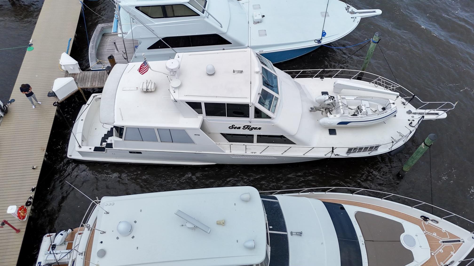 Viking-60 Cockpit Sport Yacht 1996-Sea Tiger FL-US-1996 Viking 60 Cockpit Sport Yacht docked at marina, aerial view.-9787053 | Thumbnail