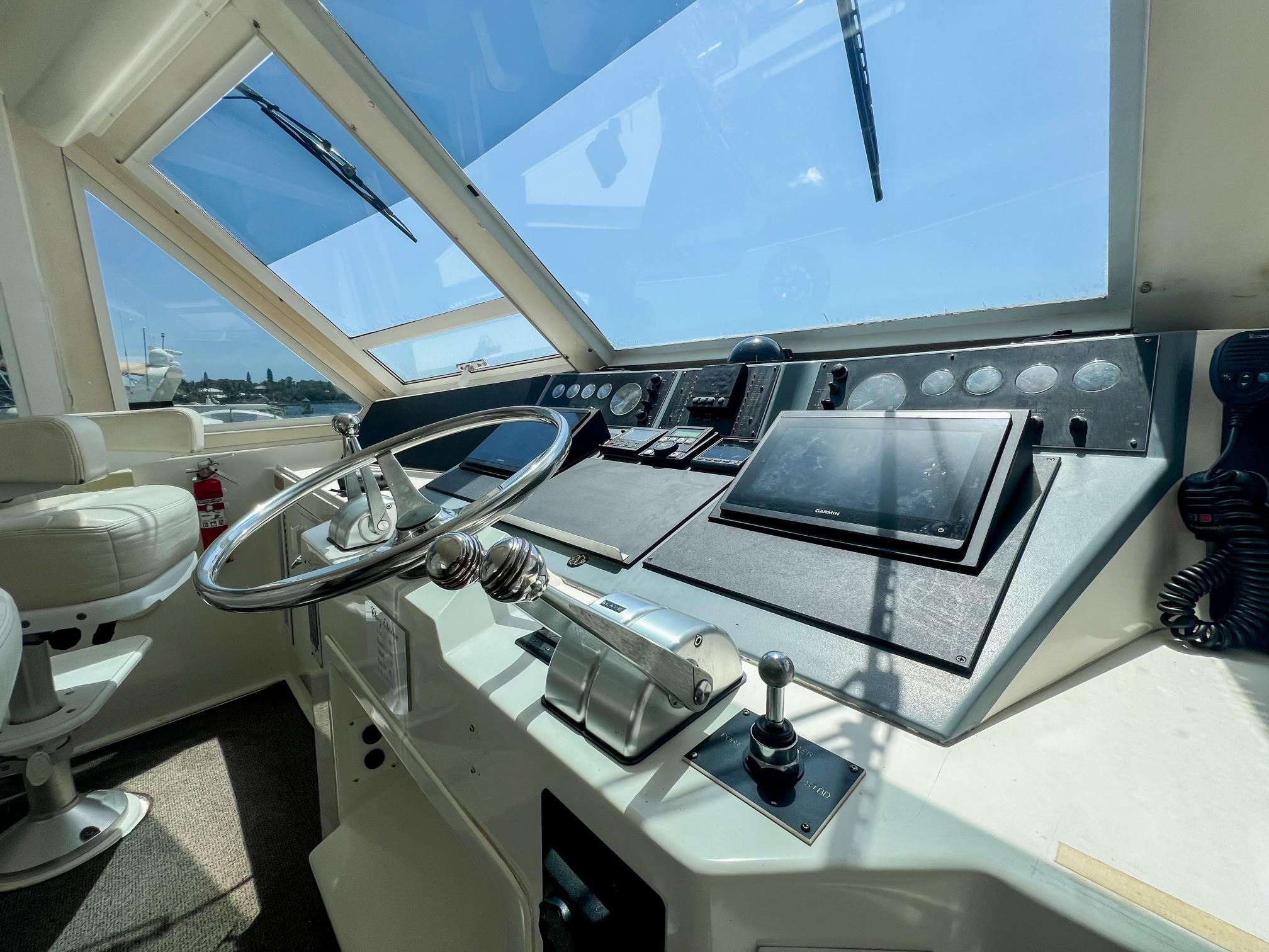 Viking-60 Cockpit Sport Yacht 1996-Sea Tiger FL-US-Helm of 1996 Viking 60 Cockpit Sport Yacht with modern navigation equipment.-9787053 | Thumbnail