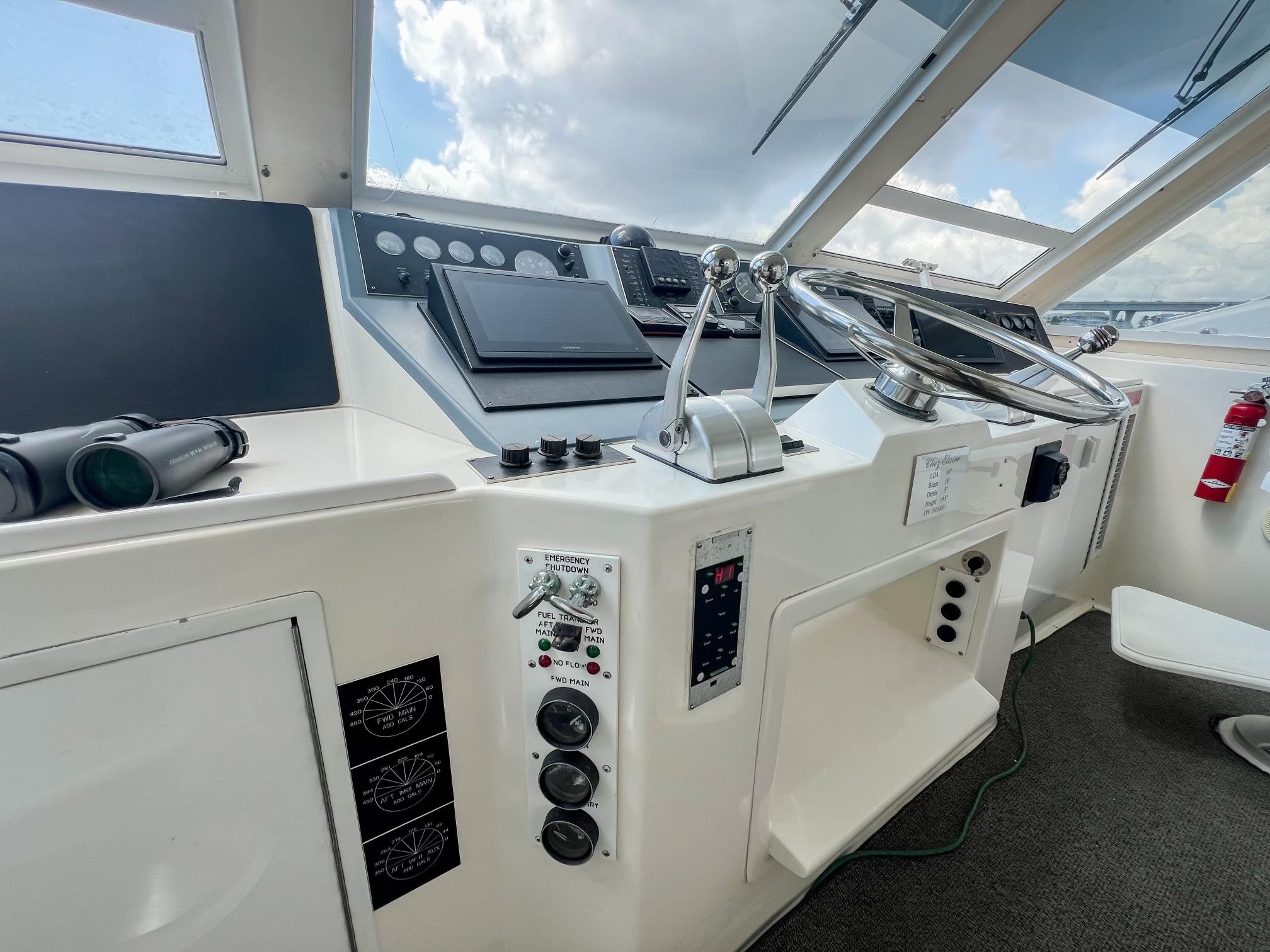 Viking-60 Cockpit Sport Yacht 1996-Sea Tiger FL-US-1996 Viking 60 Cockpit Sport Yacht helm with steering wheel and control panels.-9787053 | Thumbnail