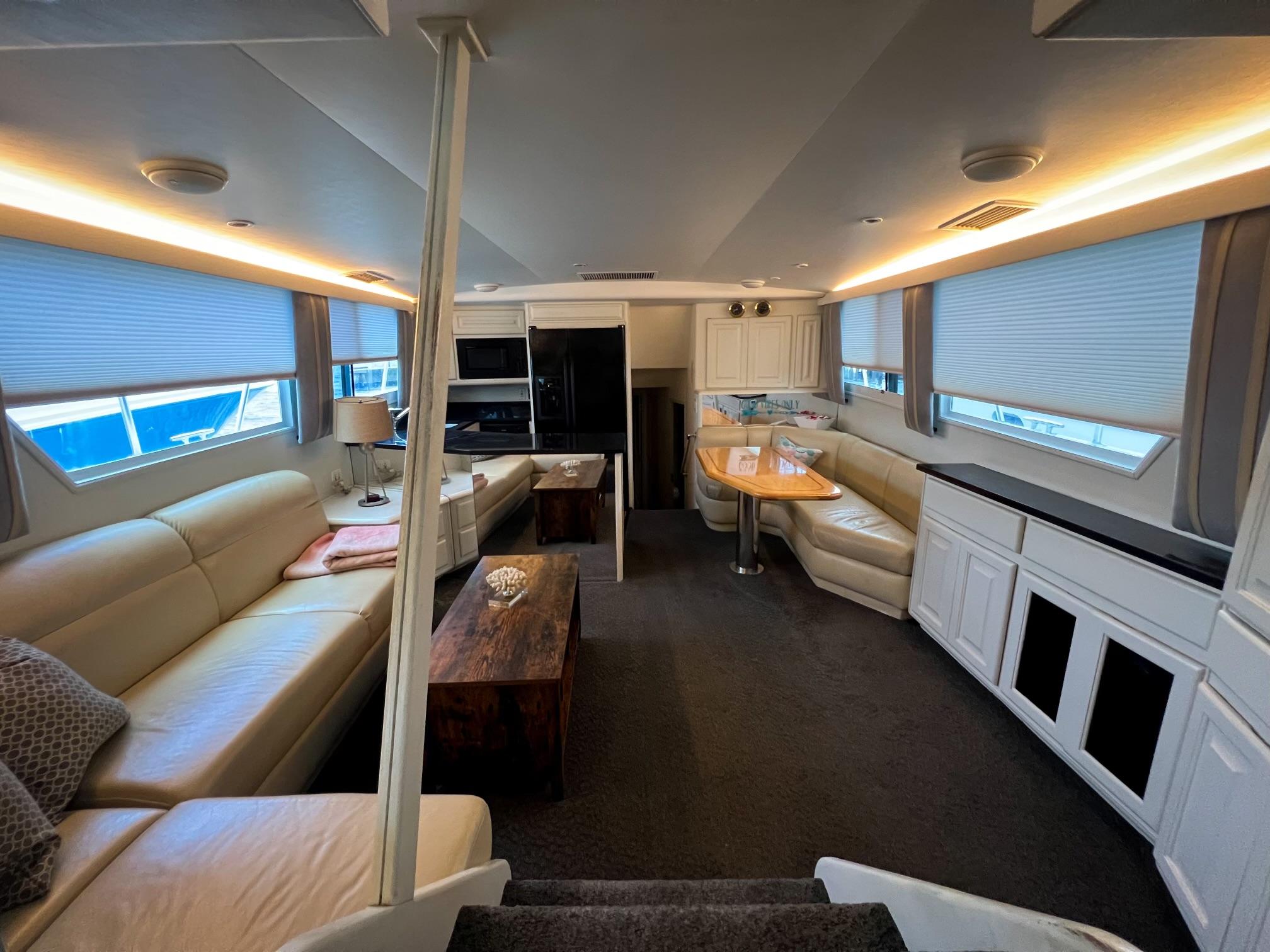 Viking-60 Cockpit Sport Yacht 1996-Sea Tiger FL-US-Luxurious interior of 1996 Viking 60 Cockpit Sport Yacht with elegant seating and dining area.-9787053 | Thumbnail