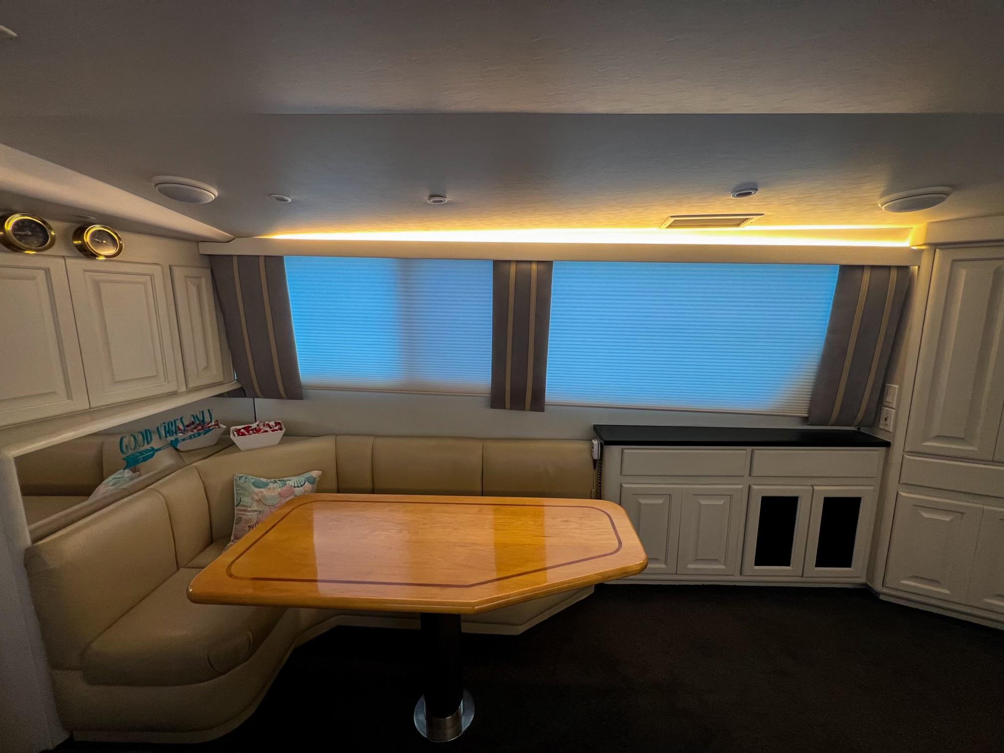 Viking-60 Cockpit Sport Yacht 1996-Sea Tiger FL-US-Luxurious interior of a 1996 Viking 60 Cockpit Sport Yacht with elegant seating and table.-9787053 | Thumbnail