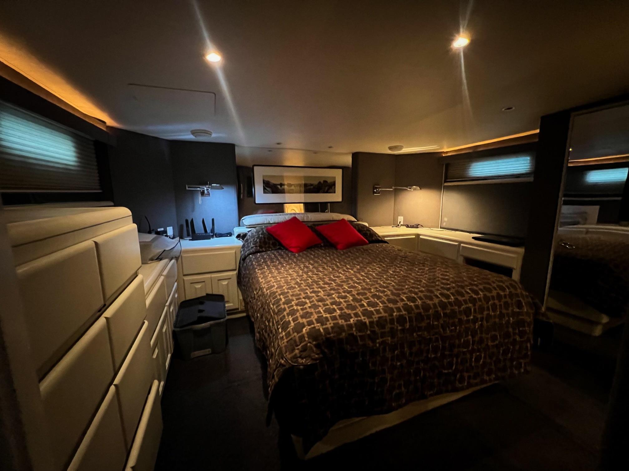 Viking-60 Cockpit Sport Yacht 1996-Sea Tiger FL-US-Luxurious bedroom in 1996 Viking 60 Cockpit Sport Yacht with modern decor and ambient lighting.-9787053 | Thumbnail