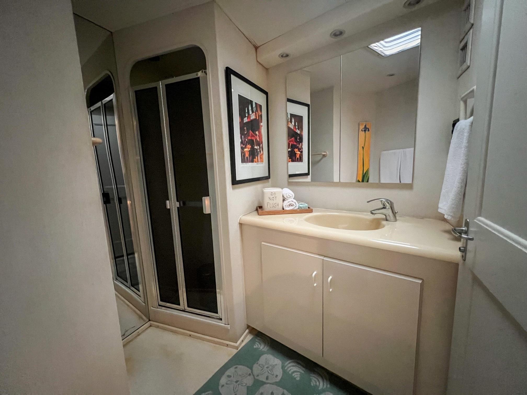 Viking-60 Cockpit Sport Yacht 1996-Sea Tiger FL-US-Bathroom interior of 1996 Viking 60 Cockpit Sport Yacht with shower and vanity.-9787053 | Thumbnail