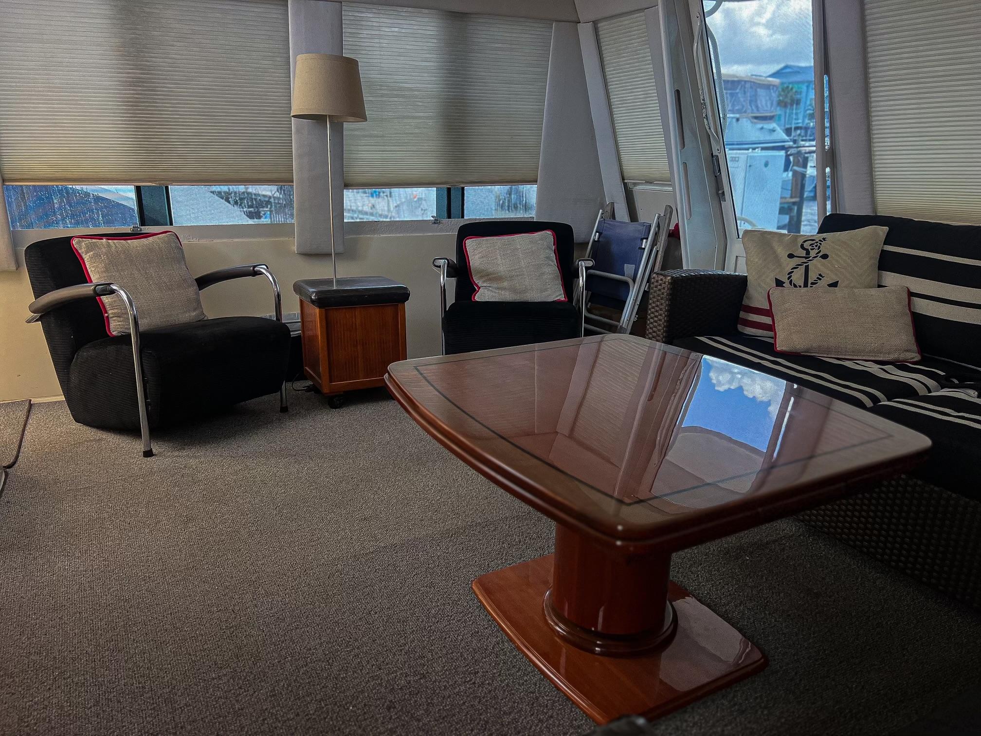 Viking-60 Cockpit Sport Yacht 1996-Sea Tiger FL-US-Luxurious interior of a 1996 Viking 60 Cockpit Sport Yacht with elegant seating and table.-9787053 | Thumbnail