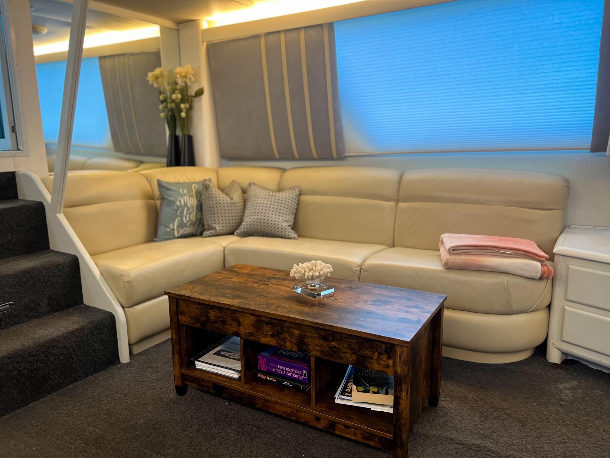 Viking-60 Cockpit Sport Yacht 1996-Sea Tiger FL-US-Luxurious interior of 1996 Viking 60 Cockpit Sport Yacht with beige sofa and wooden table.-9787053 | Thumbnail