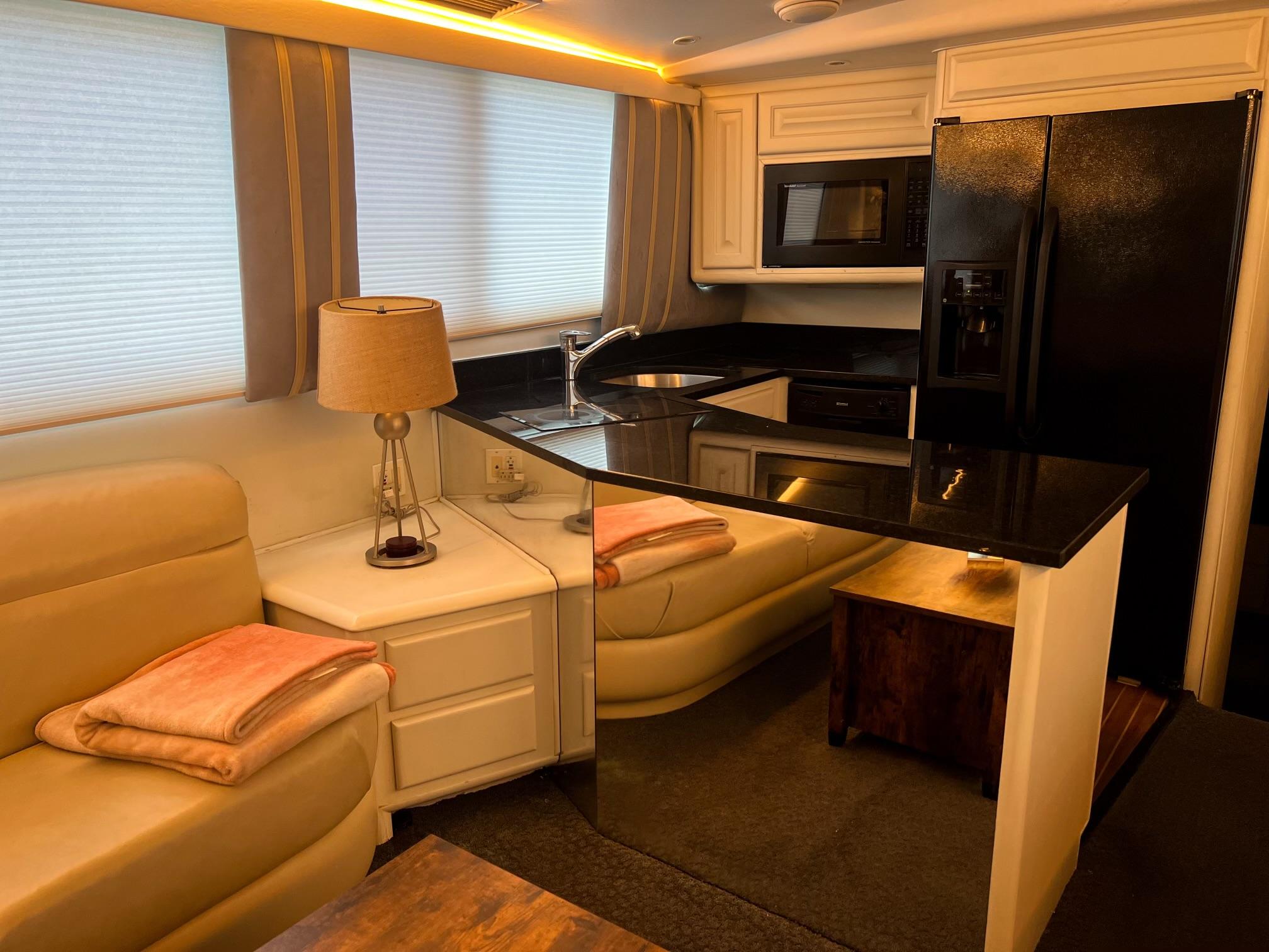 Viking-60 Cockpit Sport Yacht 1996-Sea Tiger FL-US-Luxurious interior of a 1996 Viking 60 Cockpit Sport Yacht with modern kitchen amenities.-9787053 | Thumbnail
