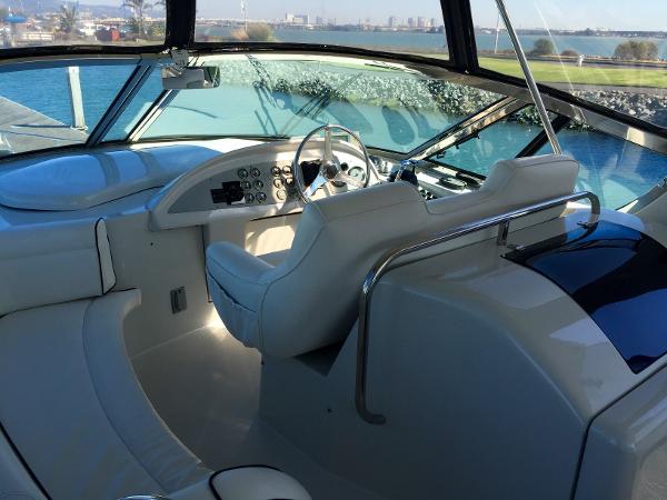 Interior of a 1999 Bluewater 5800 yacht with helm station.
