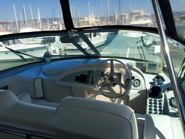 Interior view of 1999 Bluewater 5800 boat in harbor.