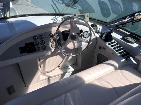 Interior of a 1999 Bluewater 5800 boat with steering console.