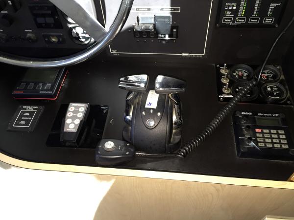 Control console of a 1999 Bluewater 5800 with various controls.