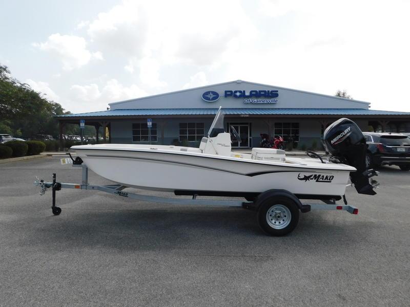 2023 Mako Pro Skiff 15 CC boat on trailer outside Polaris dealership.