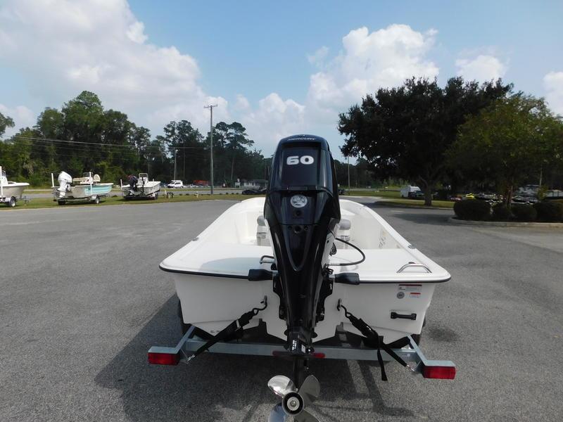2023 Mako Pro Skiff 15 CC with 60 HP engine on trailer.