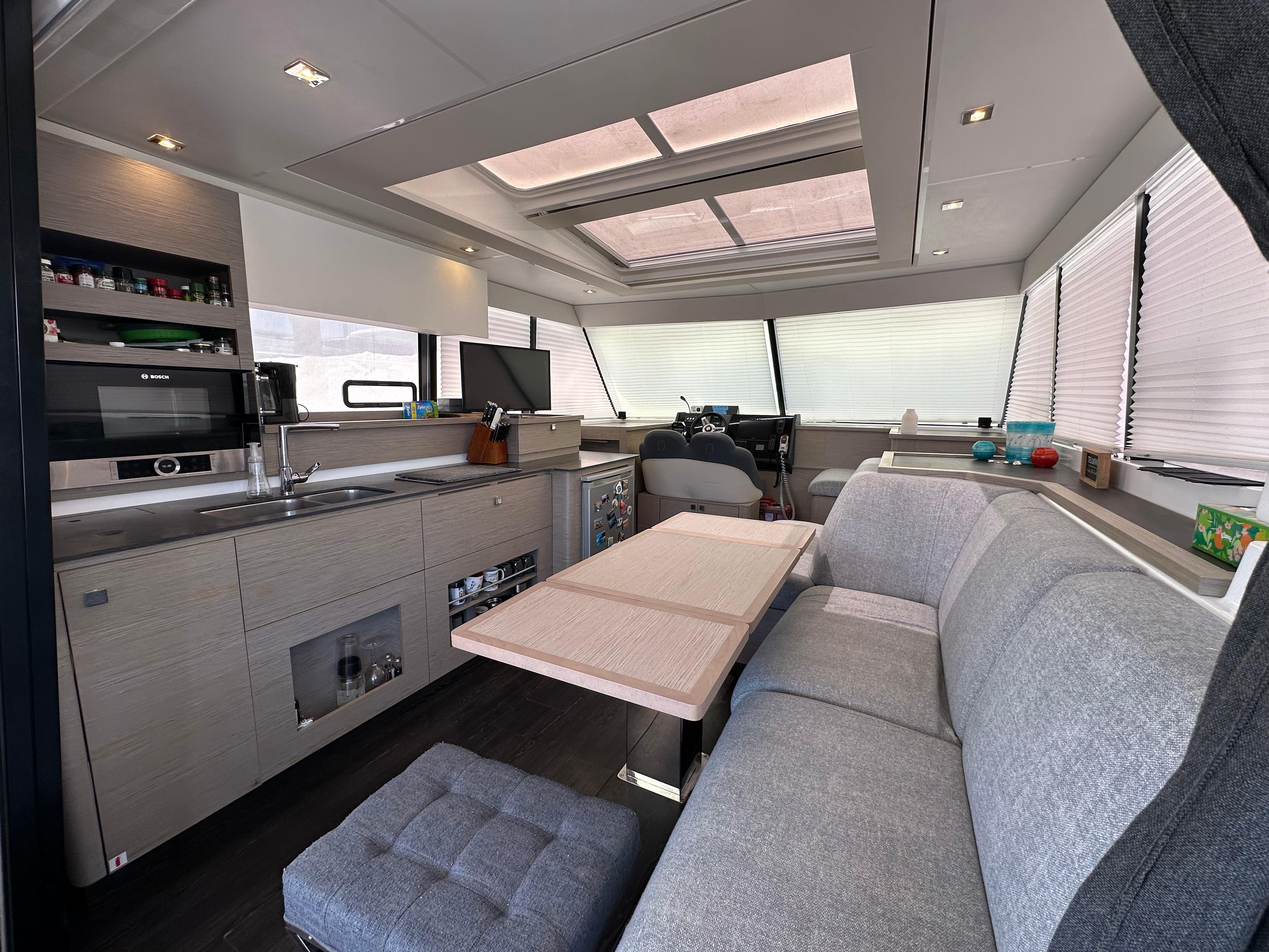 Fountaine Pajot-MY4.S 2021-Vie Pure SC-US-Luxurious interior of 2021 Fountaine Pajot MY4.S yacht with modern kitchen and seating area.-9747125 | Thumbnail