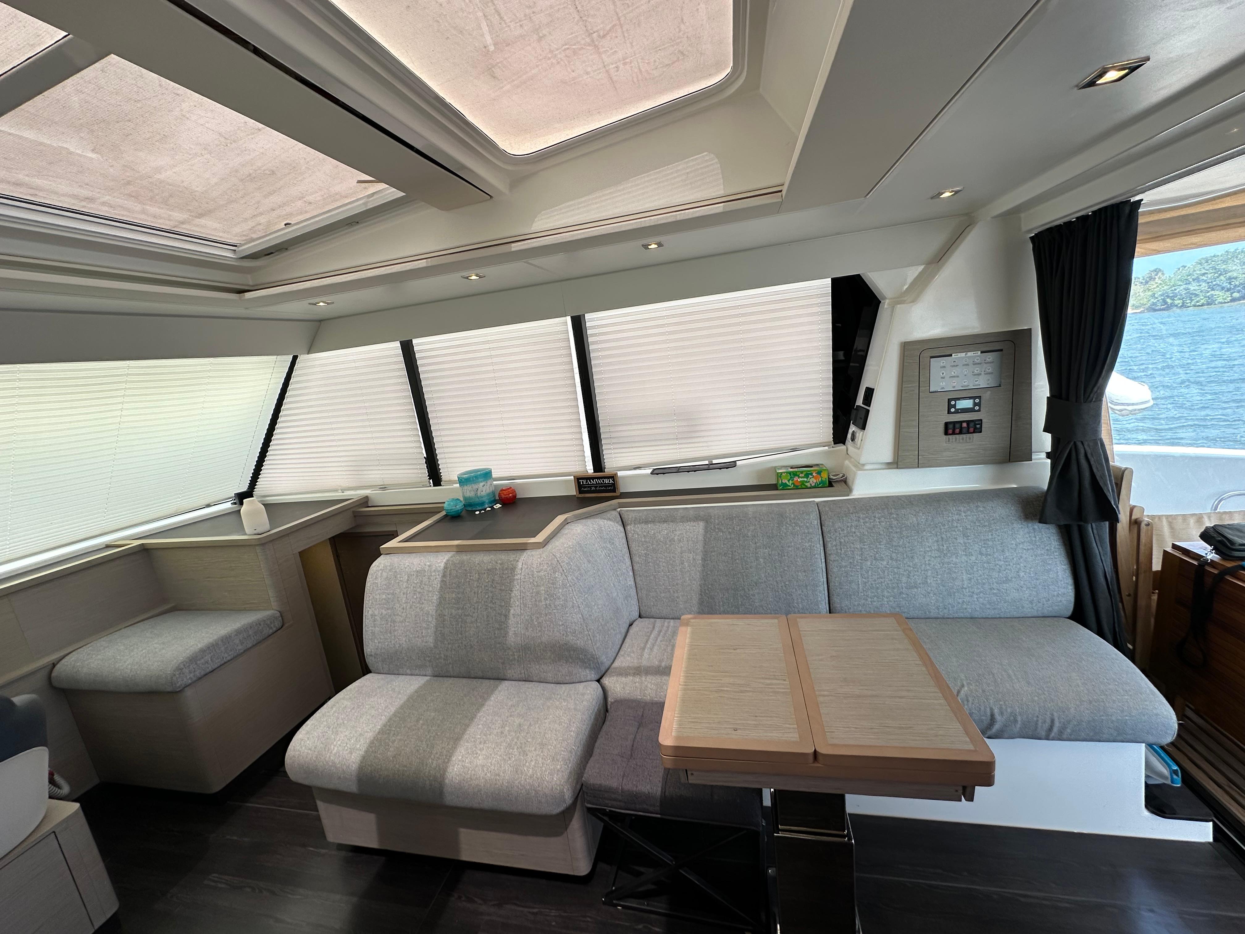 Fountaine Pajot-MY4.S 2021-Vie Pure SC-US-Luxurious interior of 2021 Fountaine Pajot MY4.S yacht with modern seating and table.-9747125 | Thumbnail