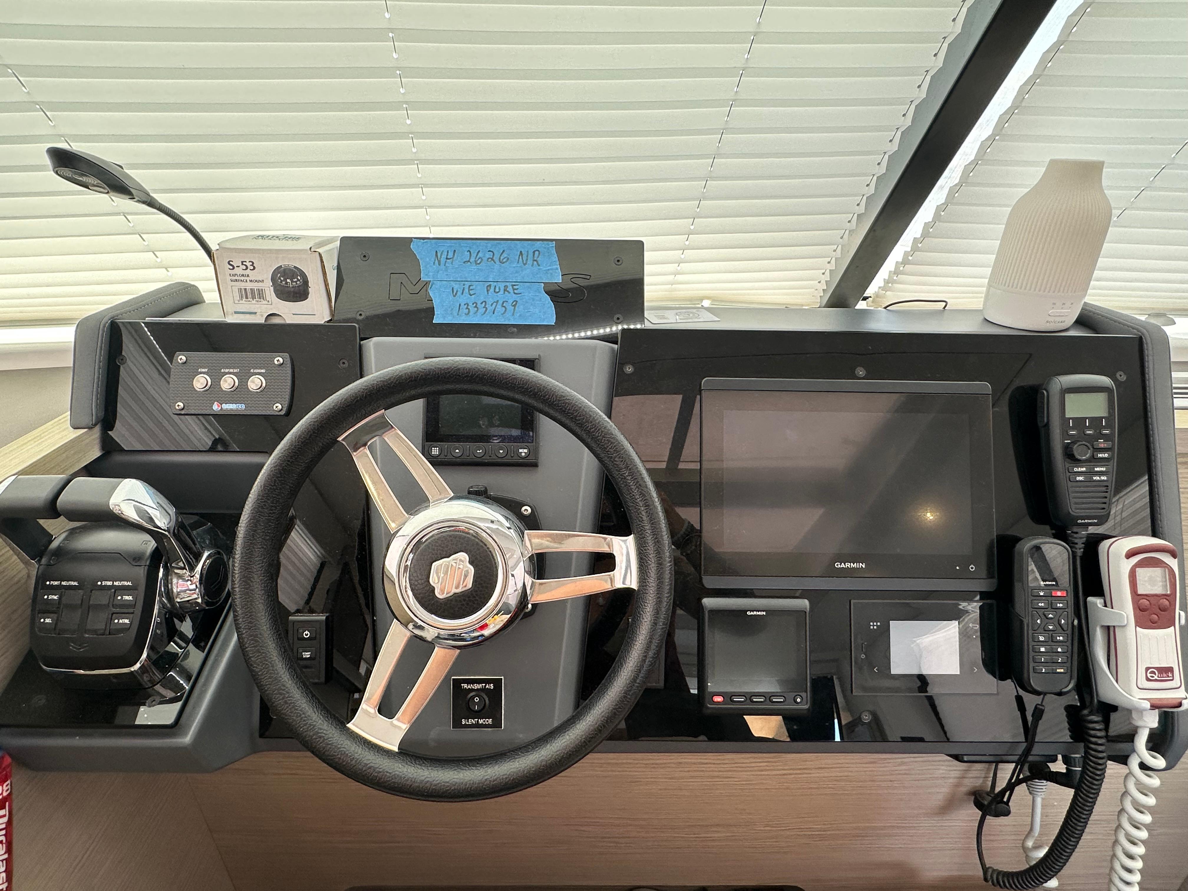 Fountaine Pajot-MY4.S 2021-Vie Pure SC-US-2021 Fountaine Pajot MY4.S helm with steering wheel, navigation screens, and communication devices.-9747125 | Thumbnail