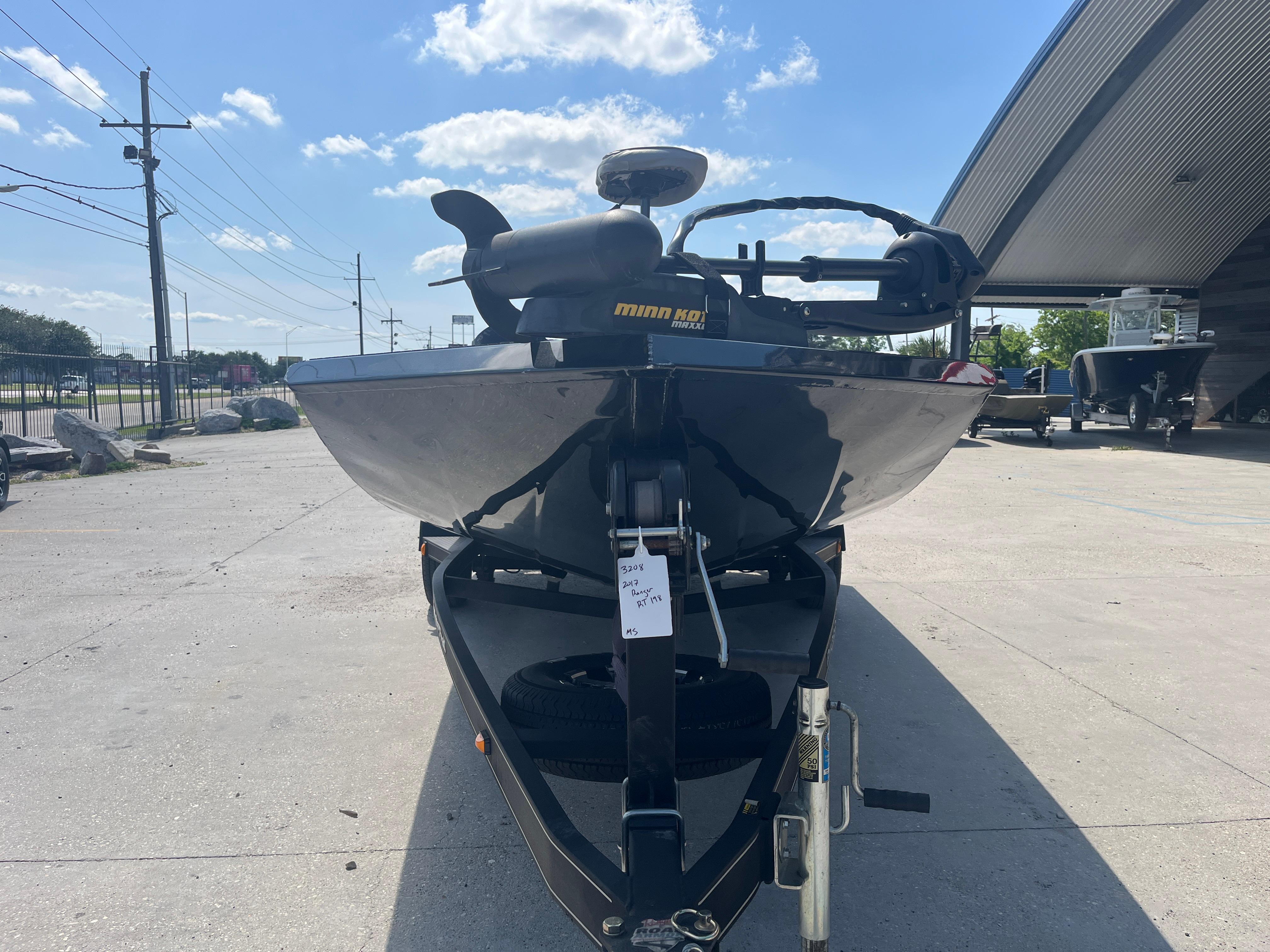 2017 Ranger RT 198P boat on trailer, parked outdoors under a clear sky.