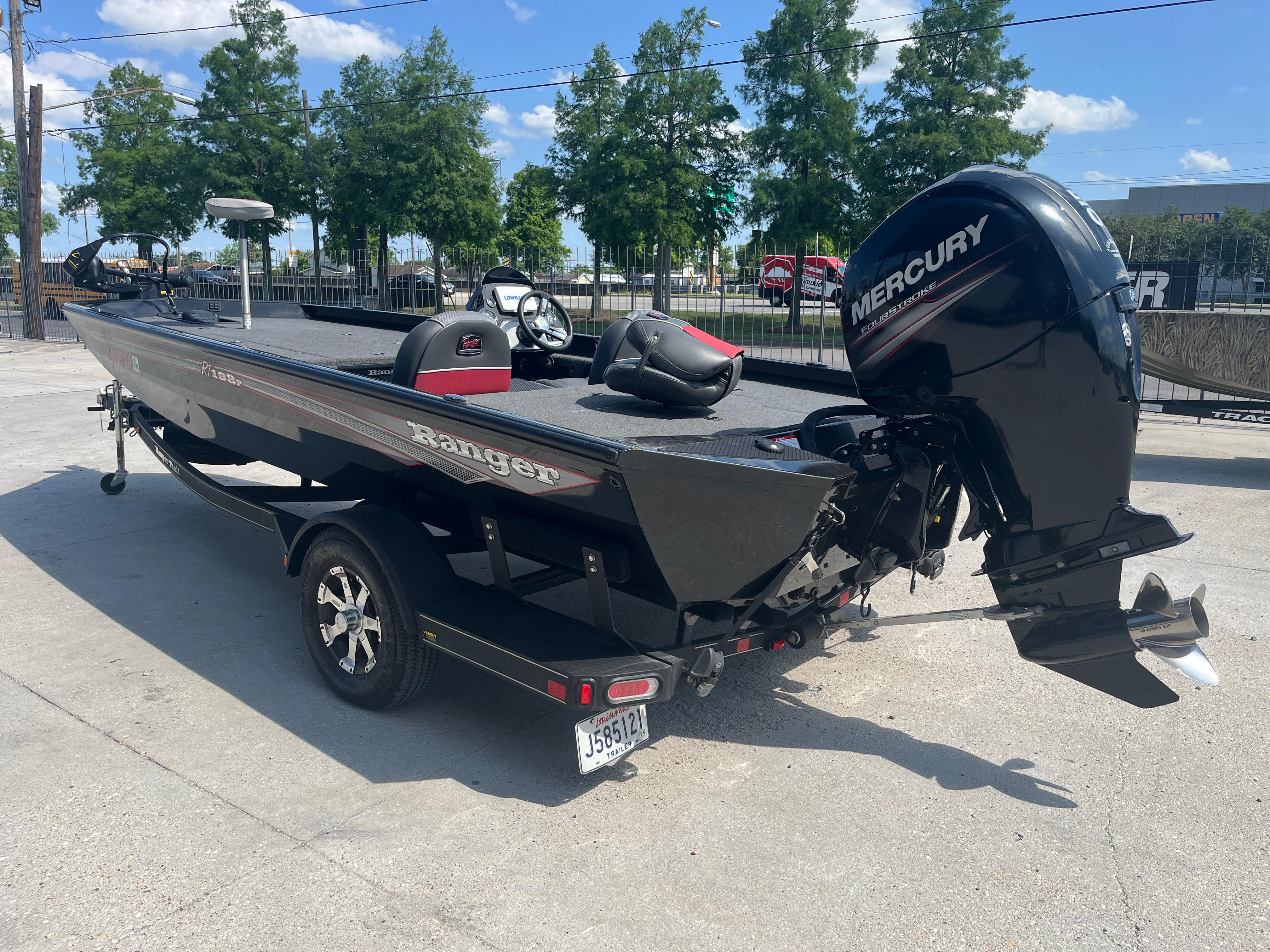 2017 Ranger RT 198P boat with Mercury engine on a sunny day.