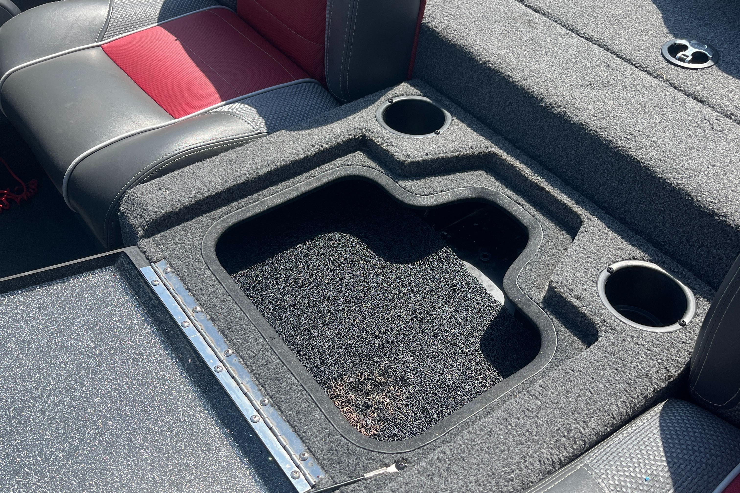 2017 Ranger RT 198P boat interior with storage compartment and cup holders.