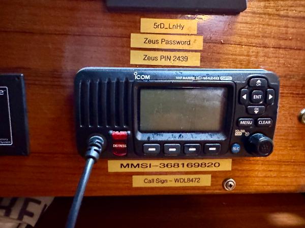 VHF marine radio on Tayana 52 Aft Cockpit, 1983, with MMSI and call sign labels.