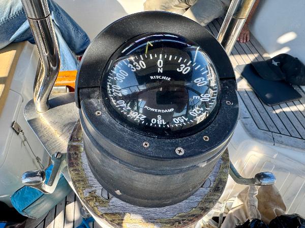 Compass on 1983 Tayana 52 Aft Cockpit sailboat, showing navigation details.