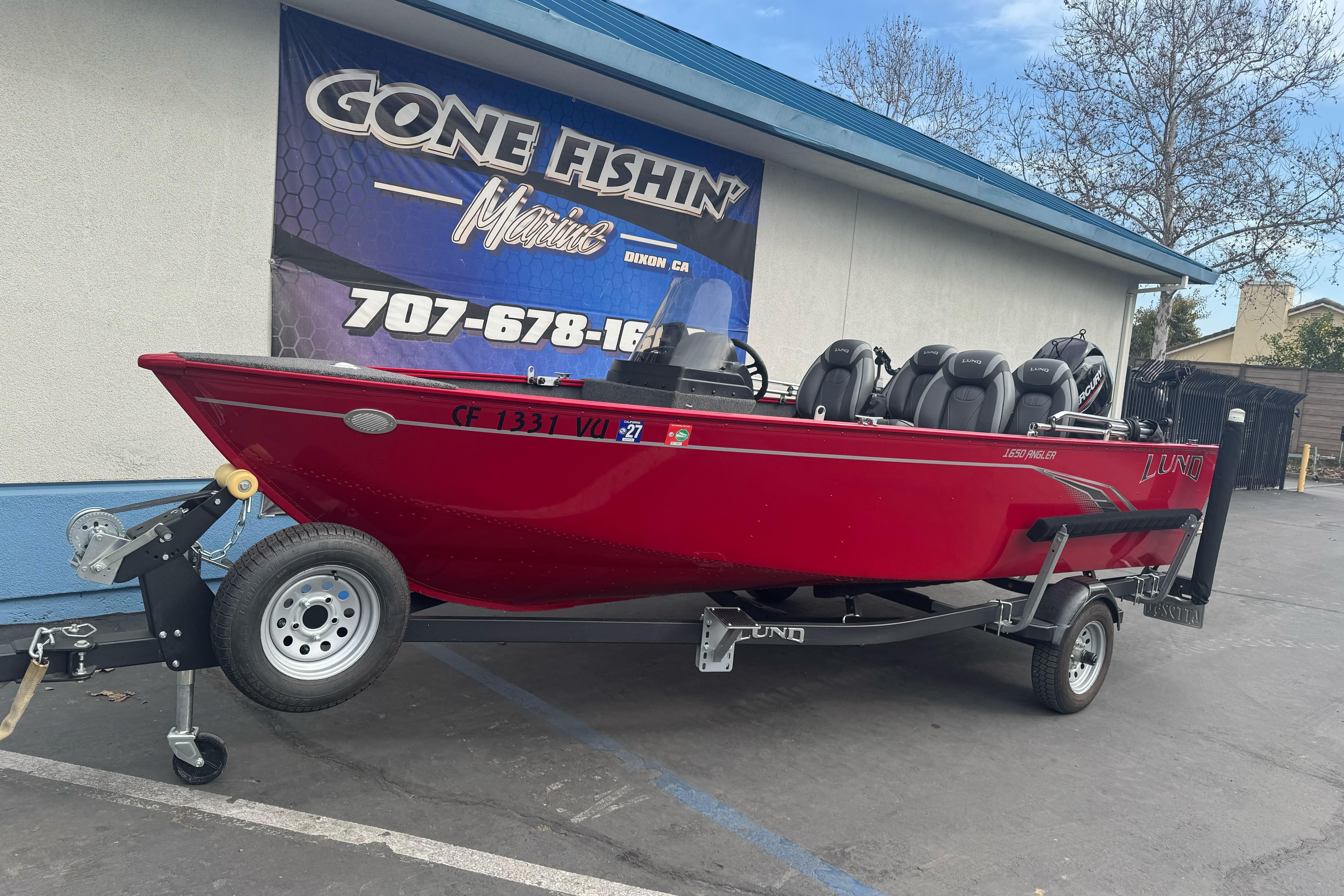 2021 Lund 1650 Angler SS boat on trailer at Gone Fishin' Marine dealership.