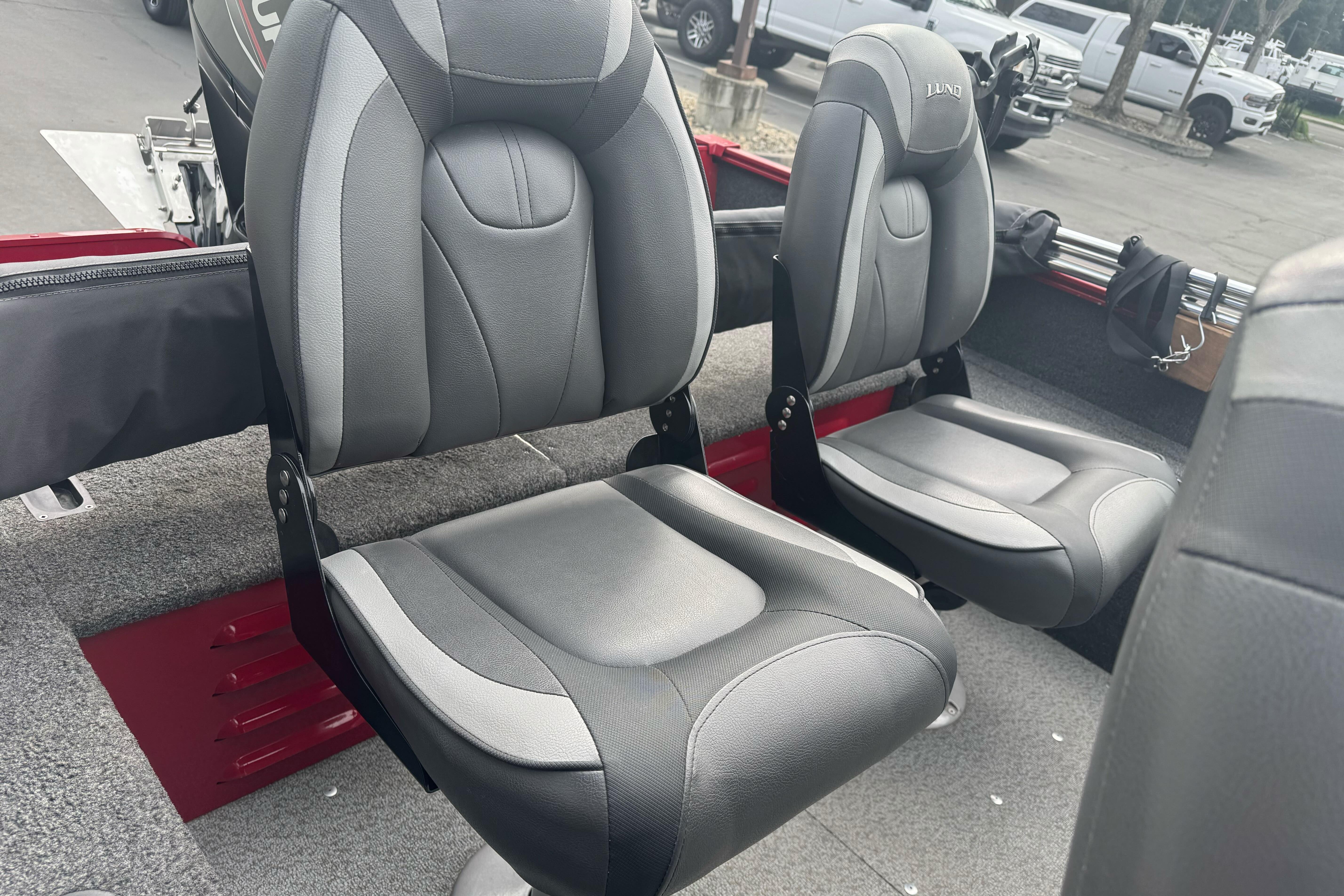 2021 Lund 1650 Angler SS boat interior with two gray cushioned seats.