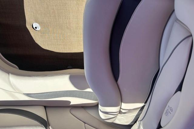 Luxurious interior seating of a 2000 Four Winns 238 Vista boat.