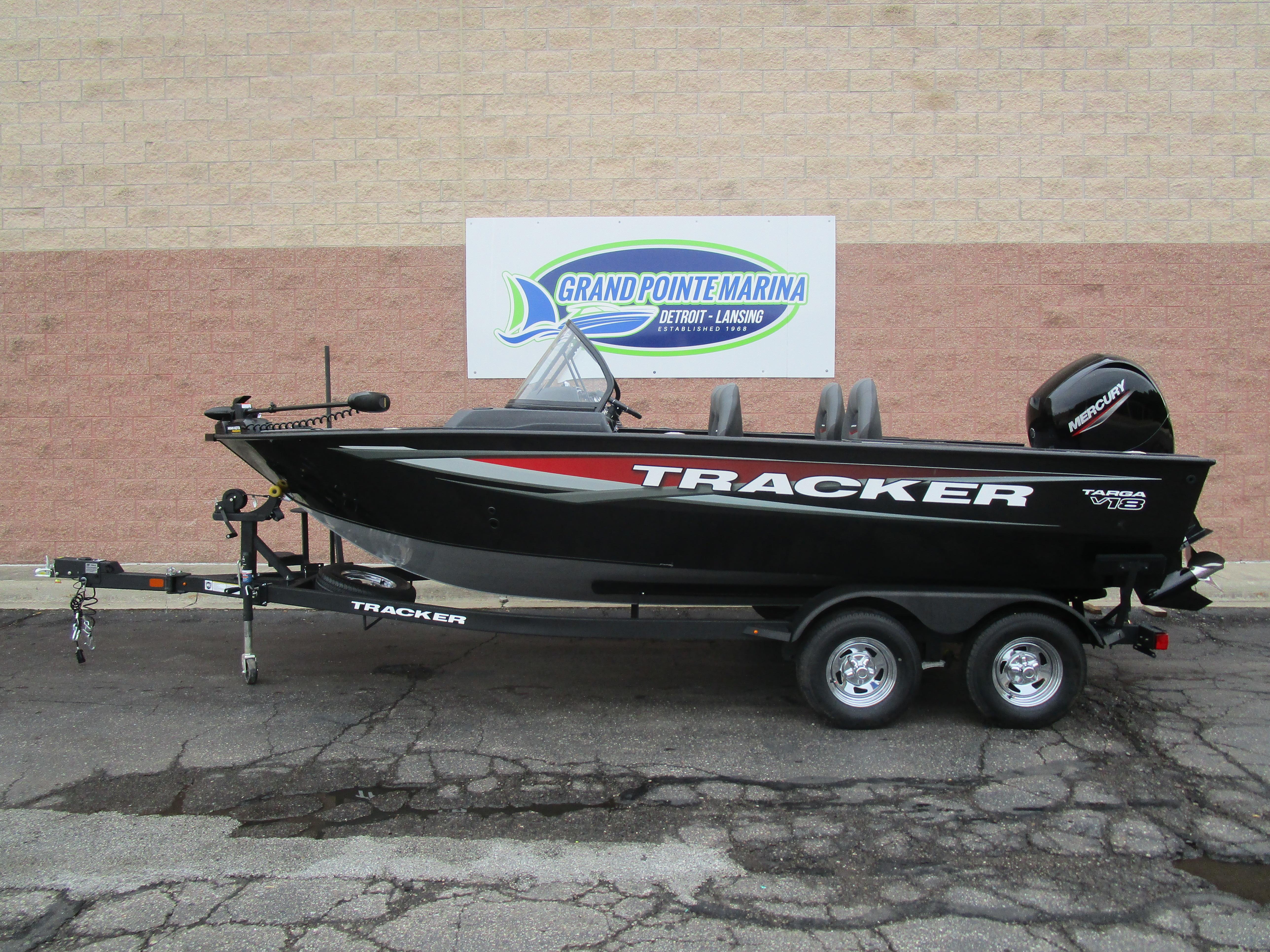 2026 Tracker Targa 18 WT boat on trailer at Grand Pointe Marina.