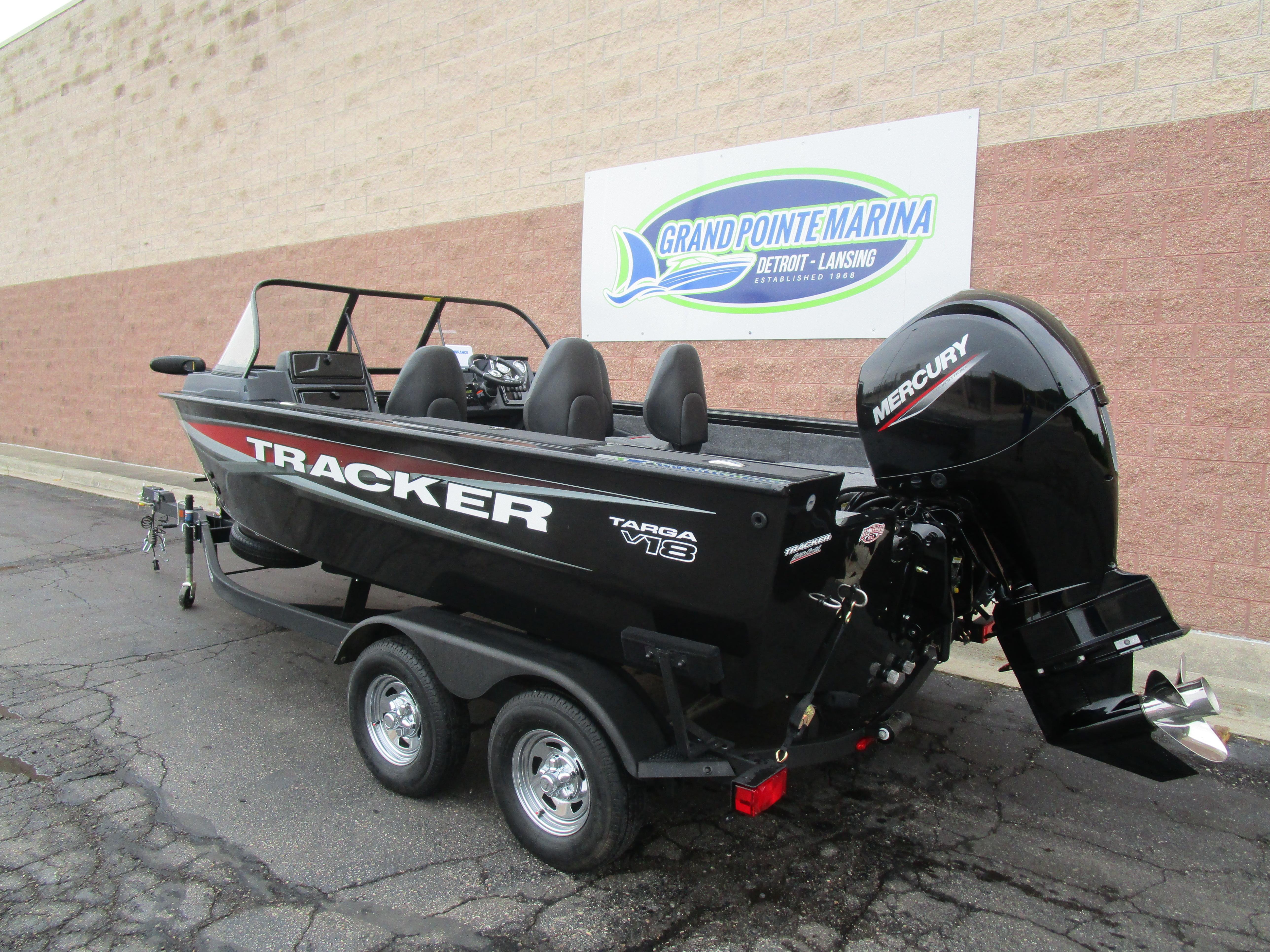 2026 Tracker Targa 18 WT boat with Mercury engine at Grand Pointe Marina.