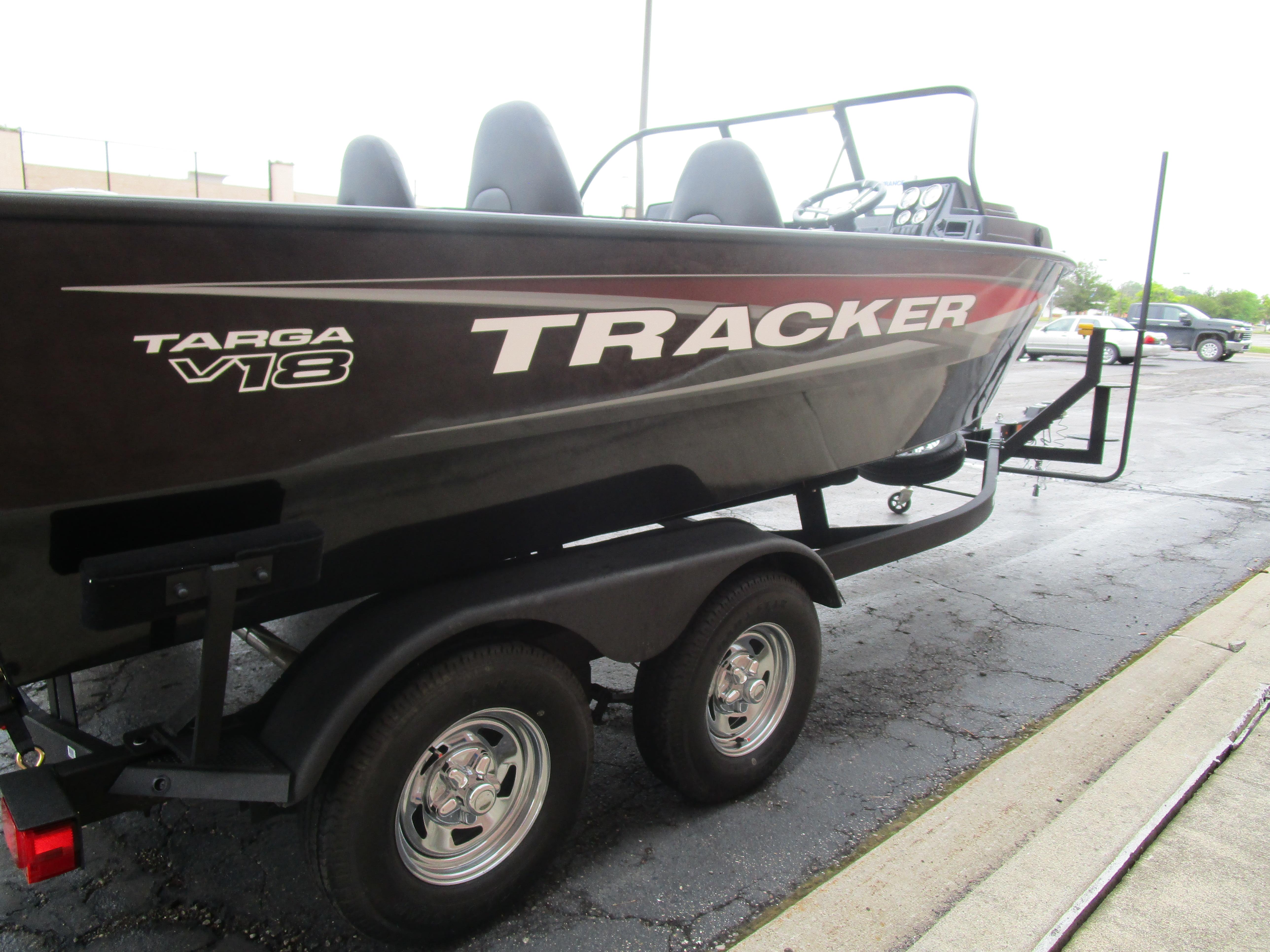2026 Tracker Targa 18 WT boat on trailer, parked outdoors.