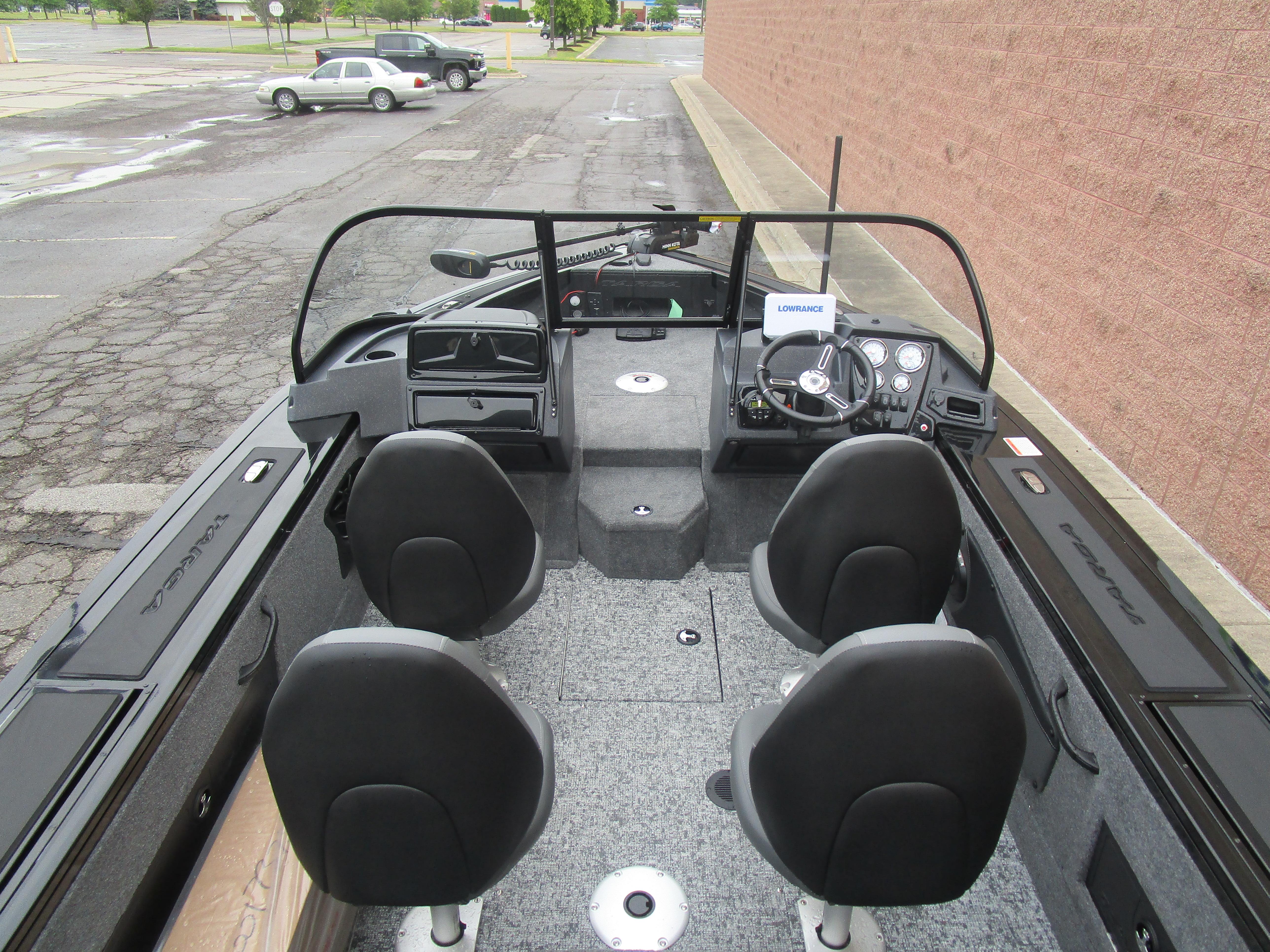 2026 Tracker Targa 18 WT boat interior with four seats and steering console.