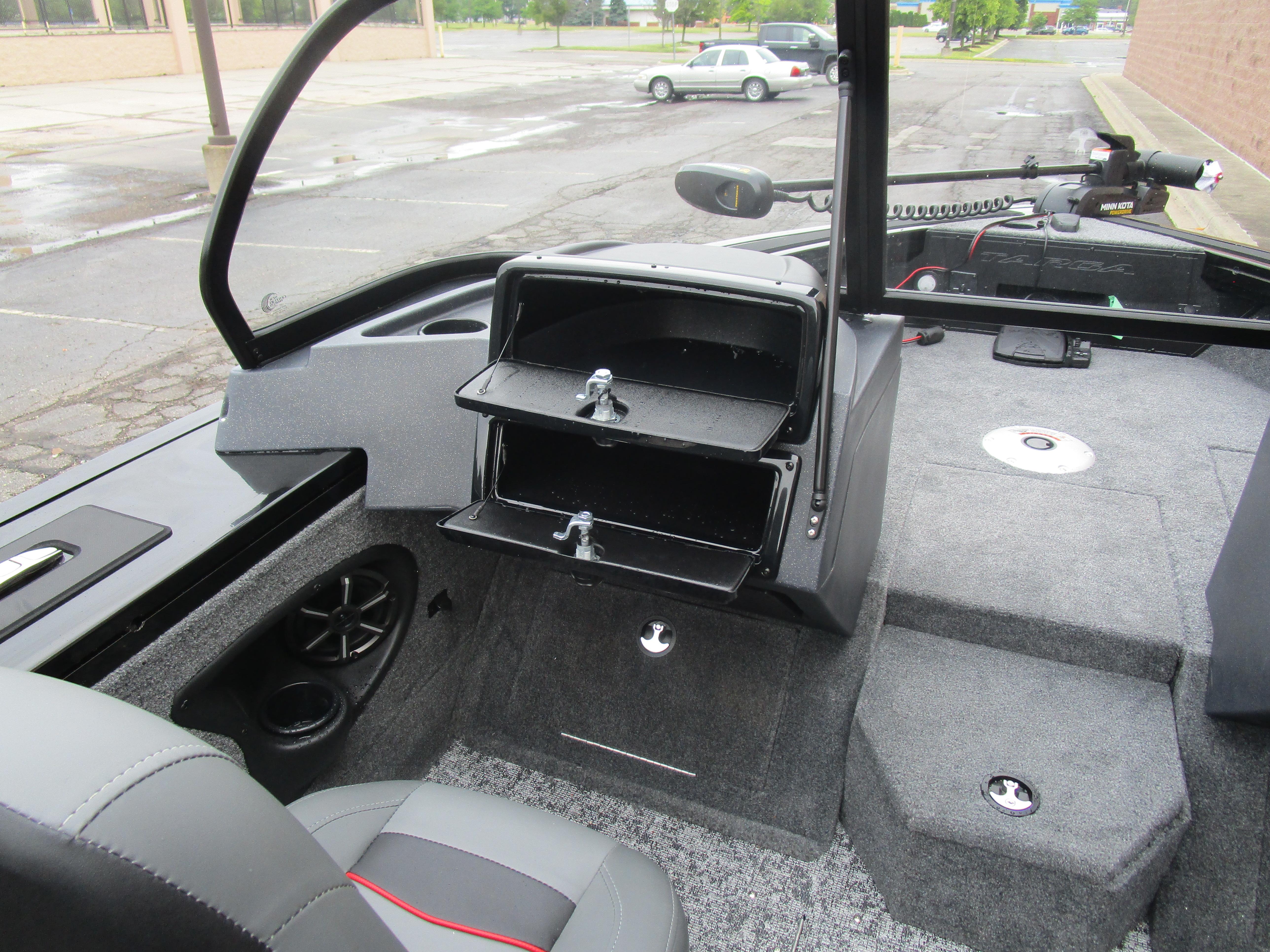2026 Tracker Targa 18 WT boat interior with storage compartments and seating.
