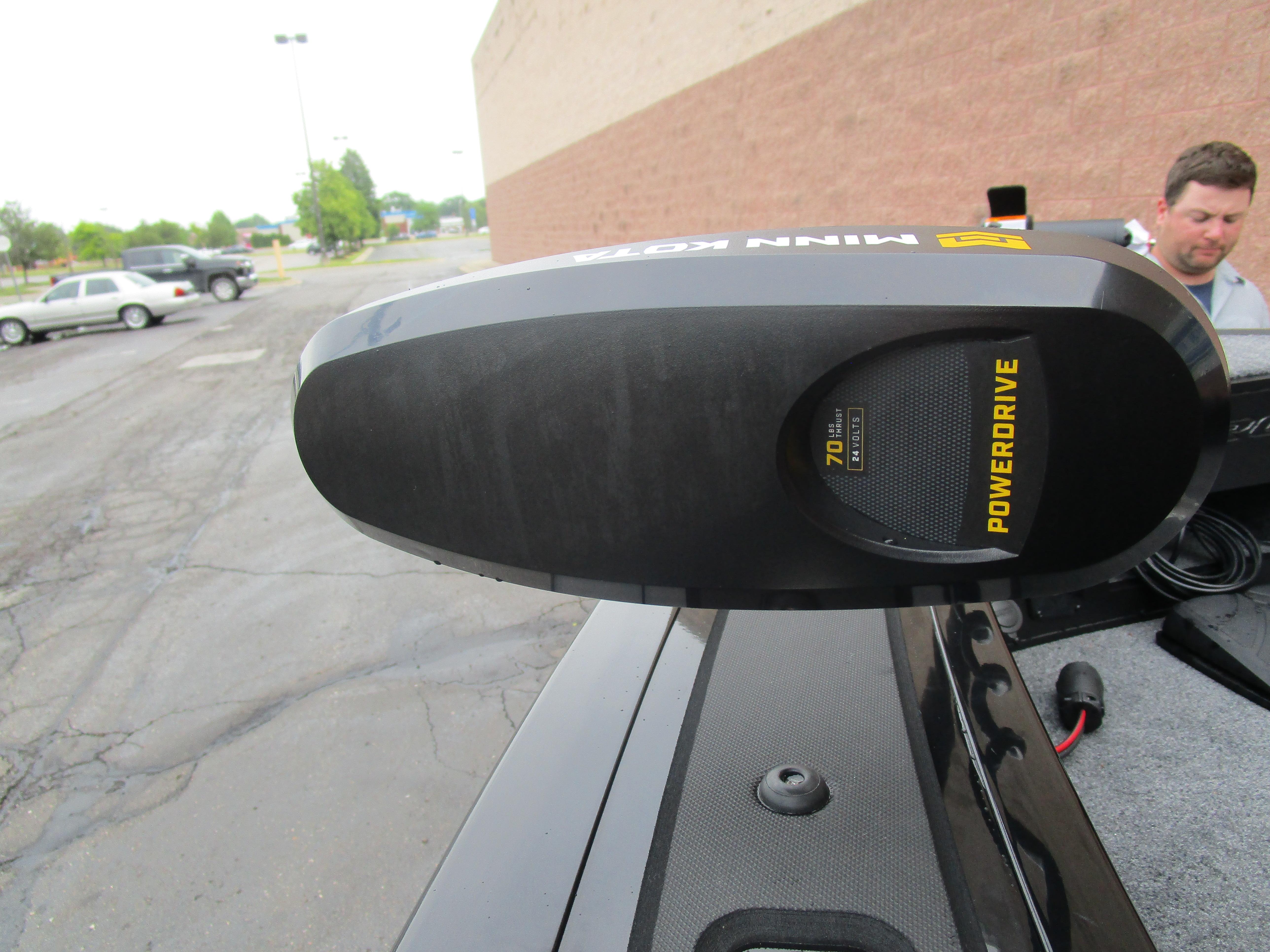 Minn Kota PowerDrive motor on 2026 Tracker Targa 18 WT boat in parking lot.