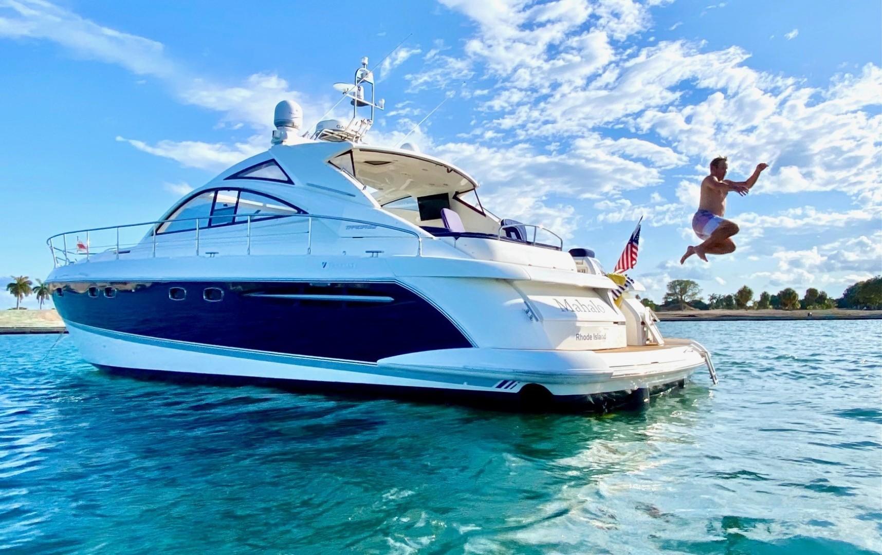 Fairline-Targa 52 2007-Mahalo FL-US-2007 Fairline Targa 52 yacht with person jumping into clear blue water.-9807222