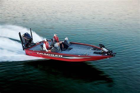 2026 Tracker Savage 215 boat speeding on water, showcasing sleek design and performance.