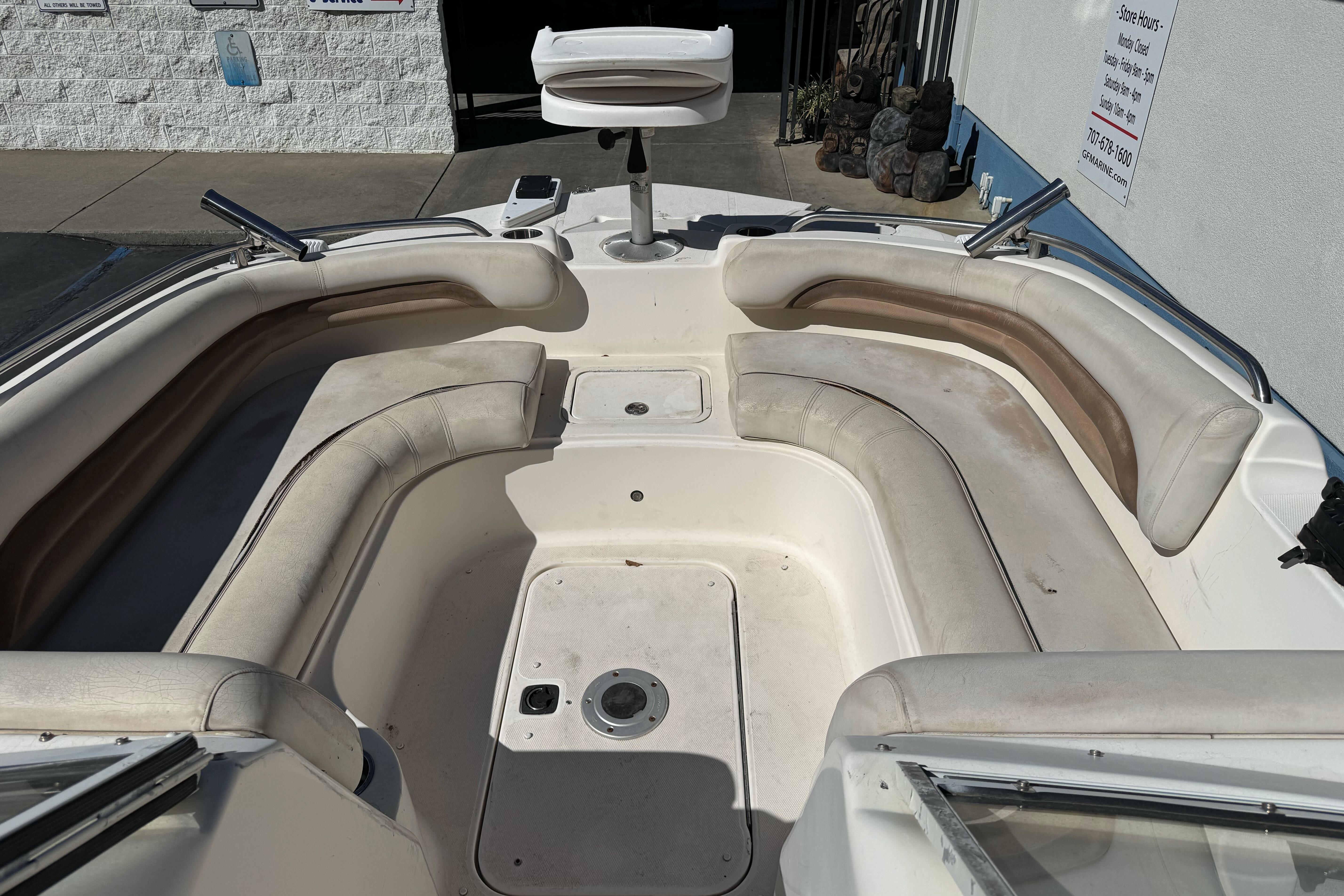 2007 Hurricane SunDeck 217 OB boat interior with spacious seating and clean design.