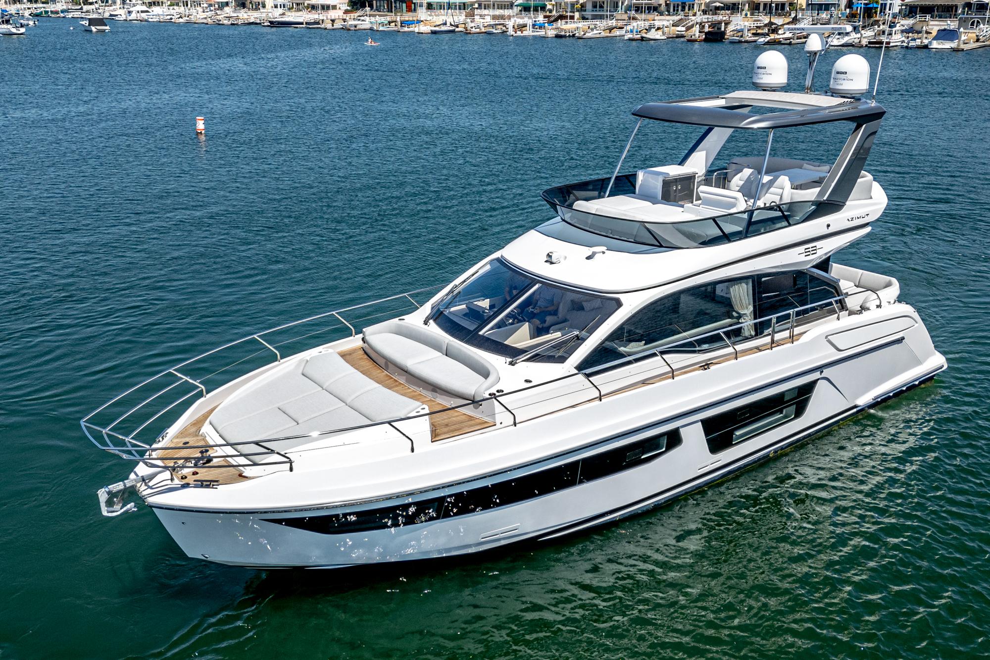 2024 Azimut Fly 53 yacht on calm water, showcasing sleek design and luxury features.
