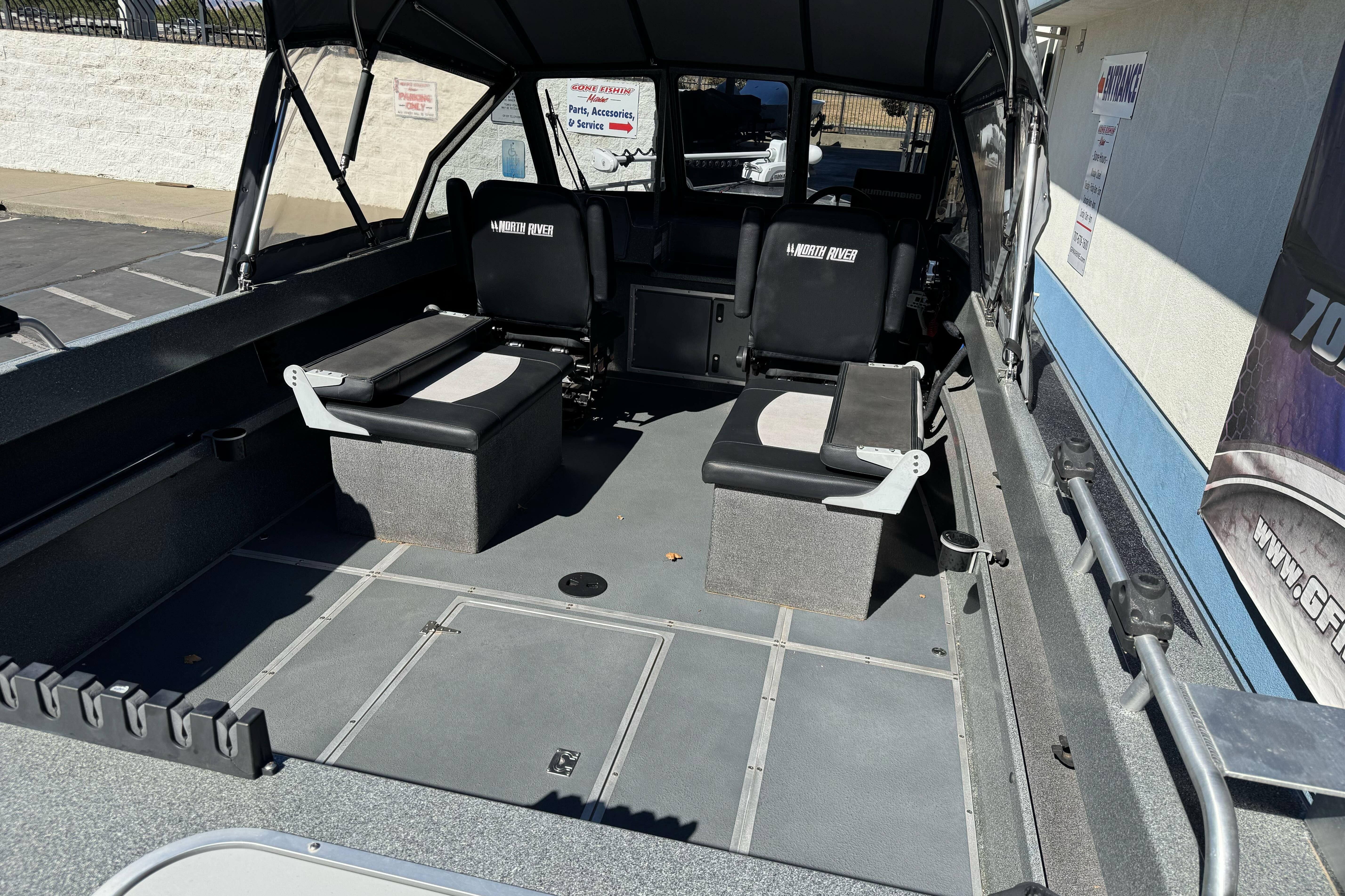 2023 North River 21 X 84 Seahawk boat interior with seating and storage compartments.