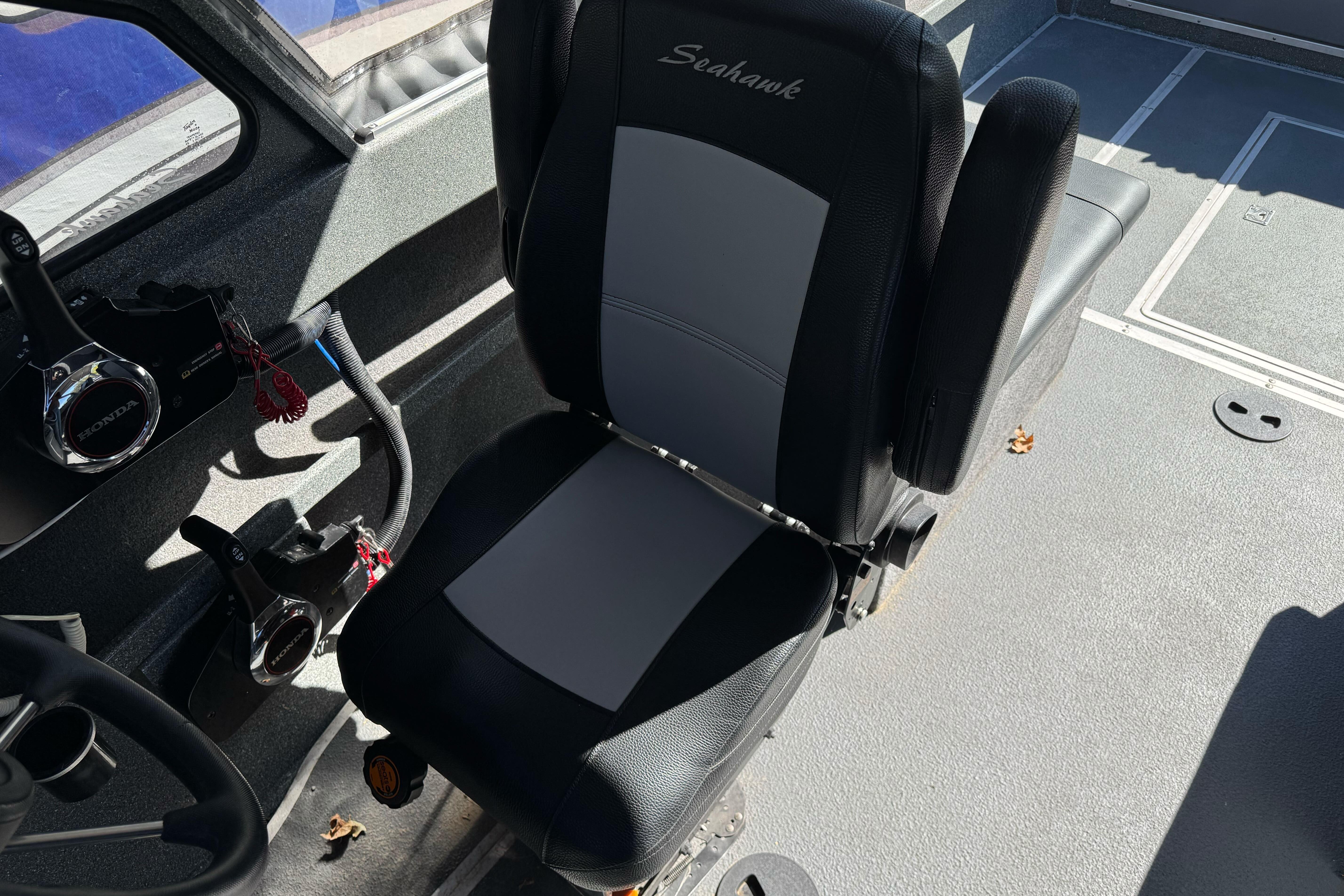 2023 North River 21 X 84 Seahawk boat interior with steering and seating.